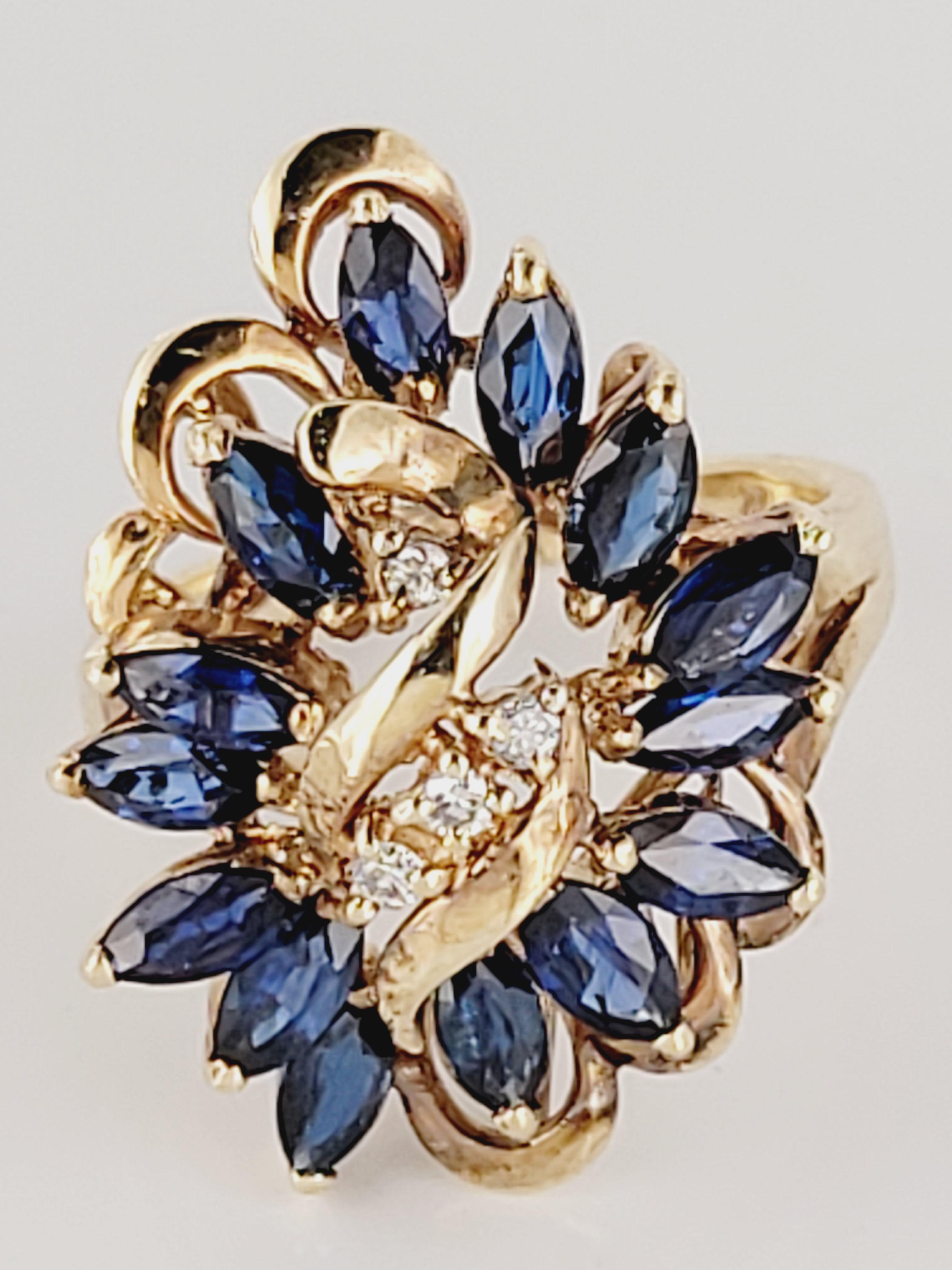 Natural Blue Sapphire 1.65 carats. Marquise cut Blue Sapphire. White Diamond 0.08ct. Set in 14K Yellow Gold. Size 6.75.