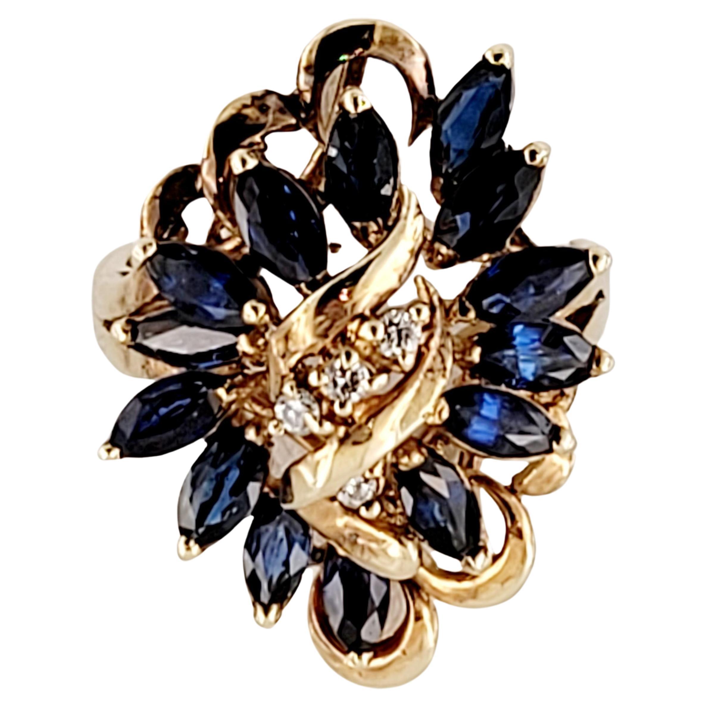 Magnifique serti d'un saphir bleu marquise et de diamants en or jaune 14 carats en vente