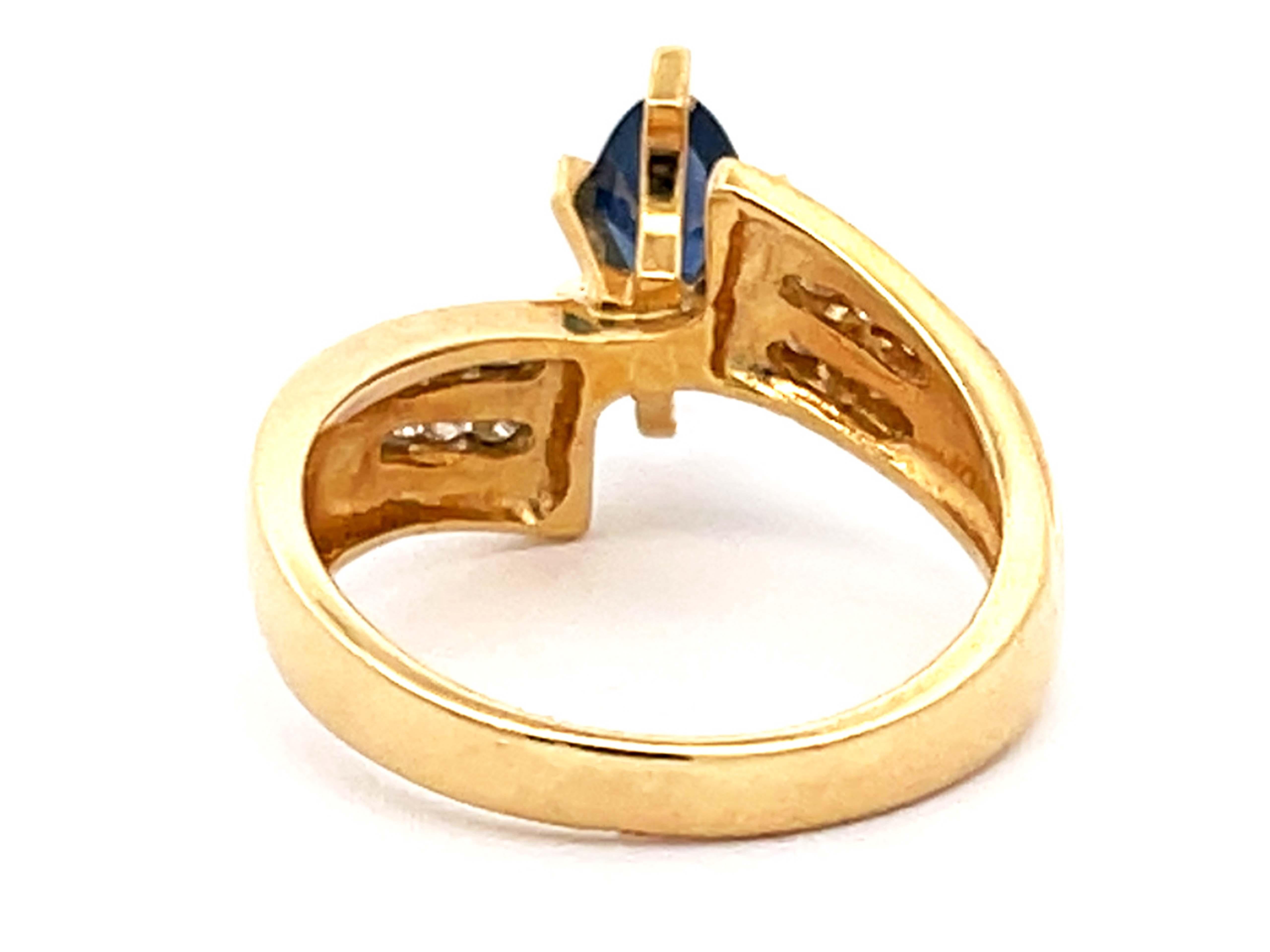 Bague vintage en or jaune 14 carats avec saphir bleu marquise et diamants en vente 1