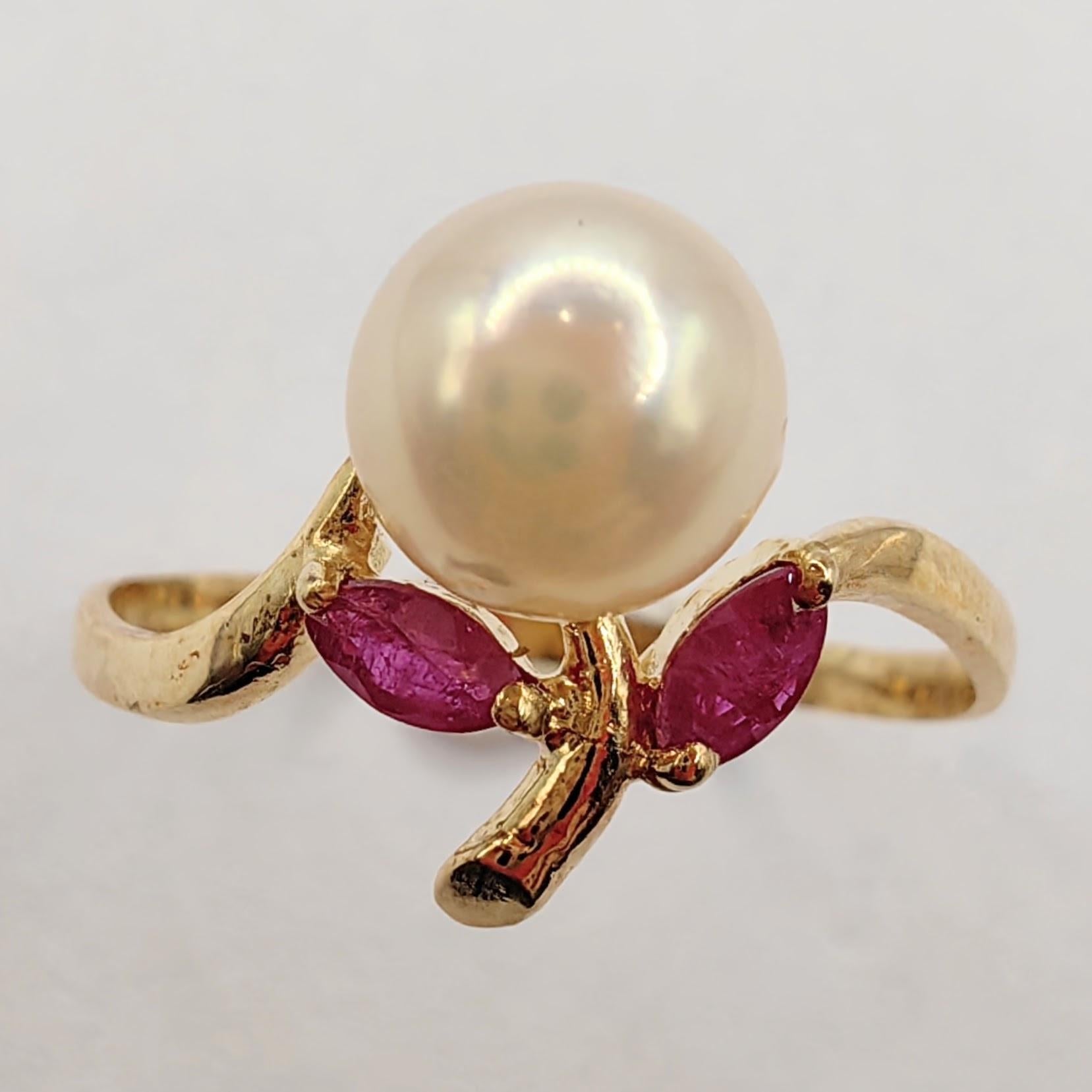 Introducing our Vintage Marquise Cut Rubies & Pearl Ring, Pendant, and Earrings Set in 14K Yellow Gold, a collection that masterfully combines classic charm with a contemporary touch.

Central to each piece in this set is a radiant Freshwater