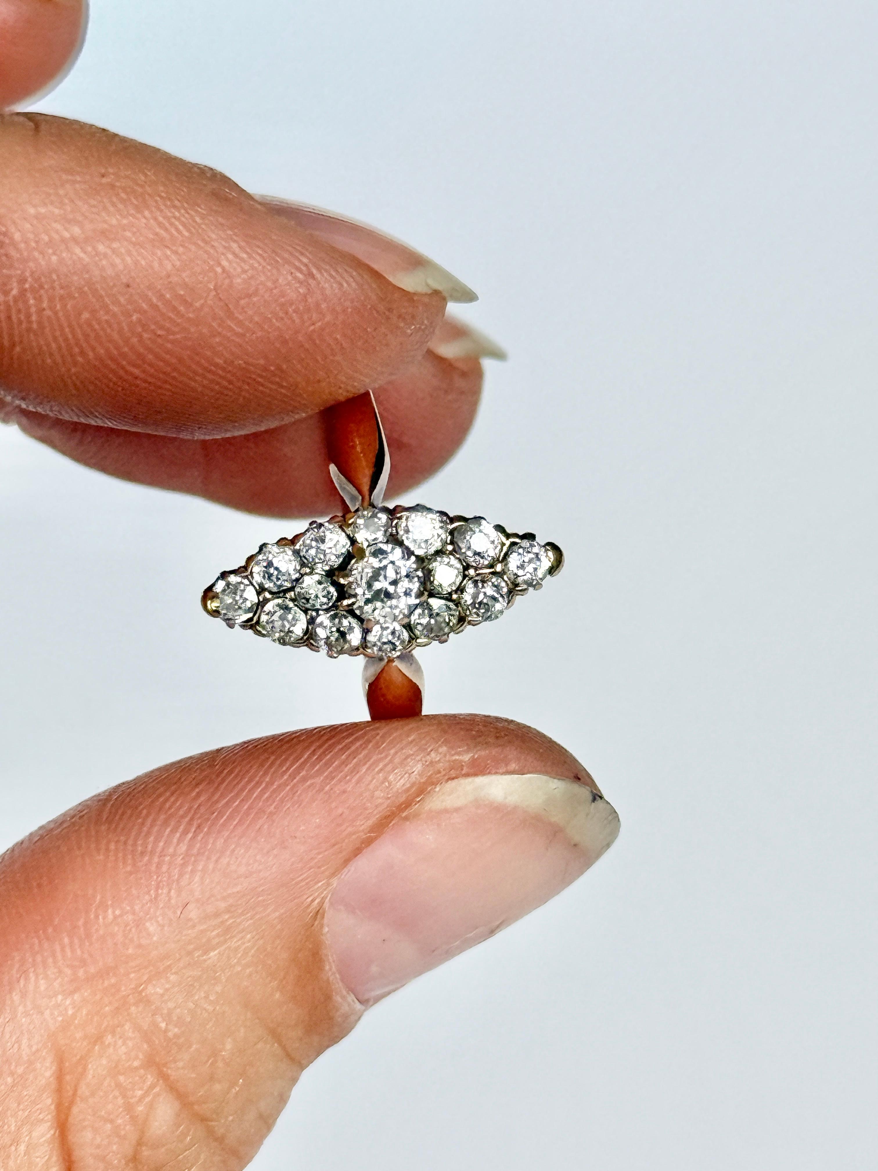 This absolute stunner holds approximately 82pts in total of shimmering Old mine cut Diamonds! They have a wonderful sparkle. There is a stamp faintly reading 585 which means 14 carat gold. There is engraving on the inside of the band reading 'PM