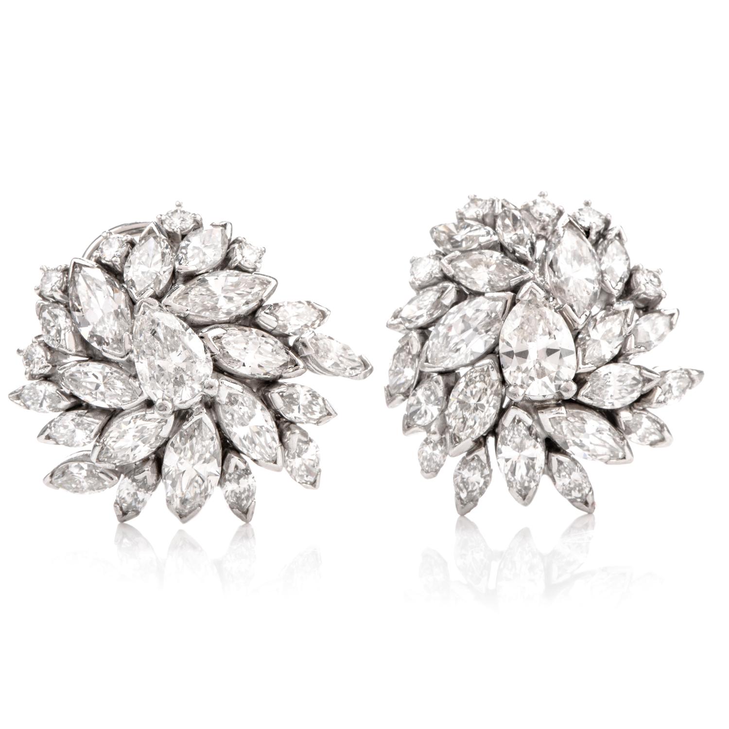 These incredible Vintage Diamond cluster Earrings were inspired in a floral button motif and 

crafted in platinum.

Adorning the centers with 1 pear shaped diamond weighing approx. 1.50 carats in total.

  Surrounding are elegantly shaped marquise