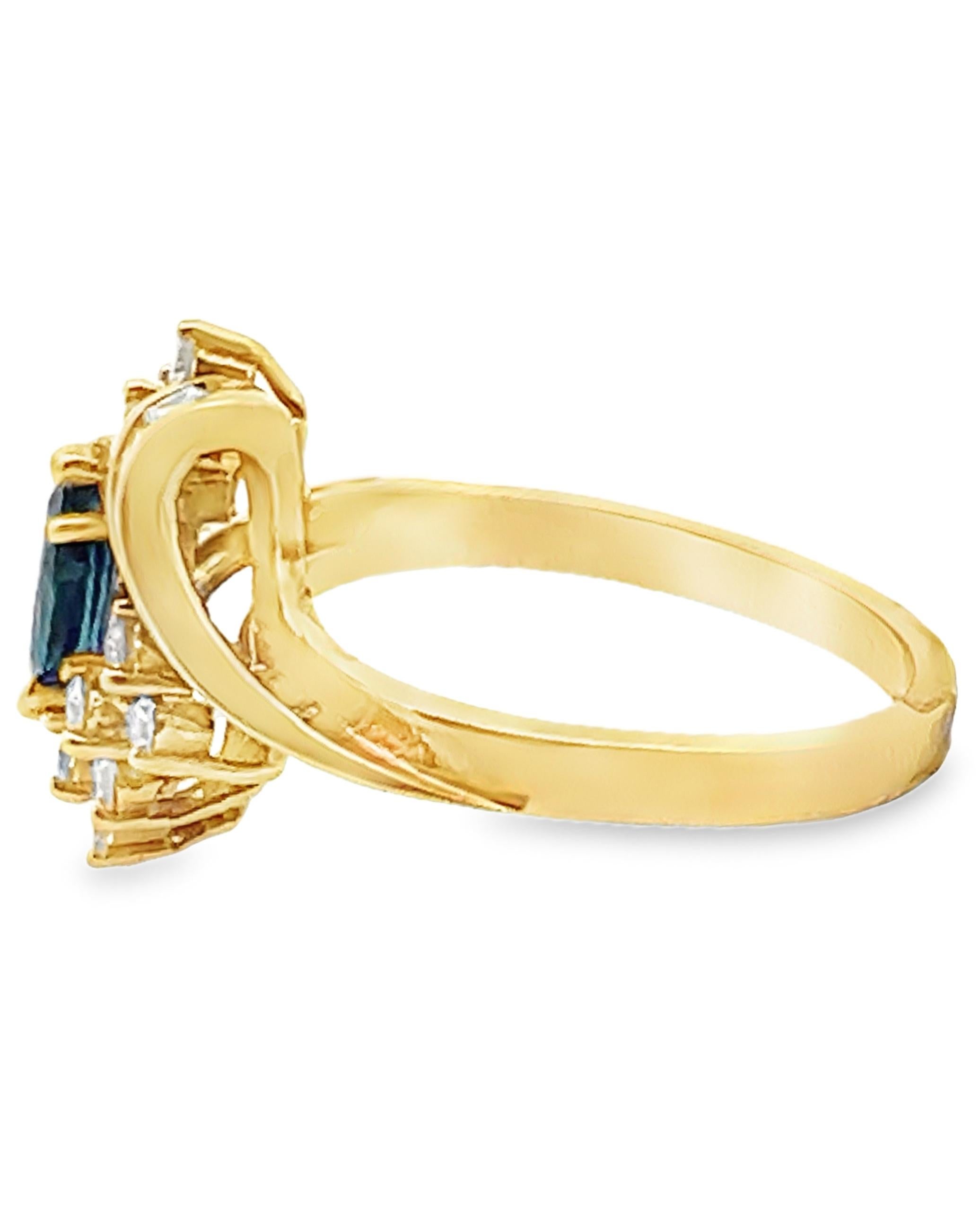 Contemporary Vintage Marquise Sapphire Ring with Baguette and Round Diamonds in 18K Gold For Sale