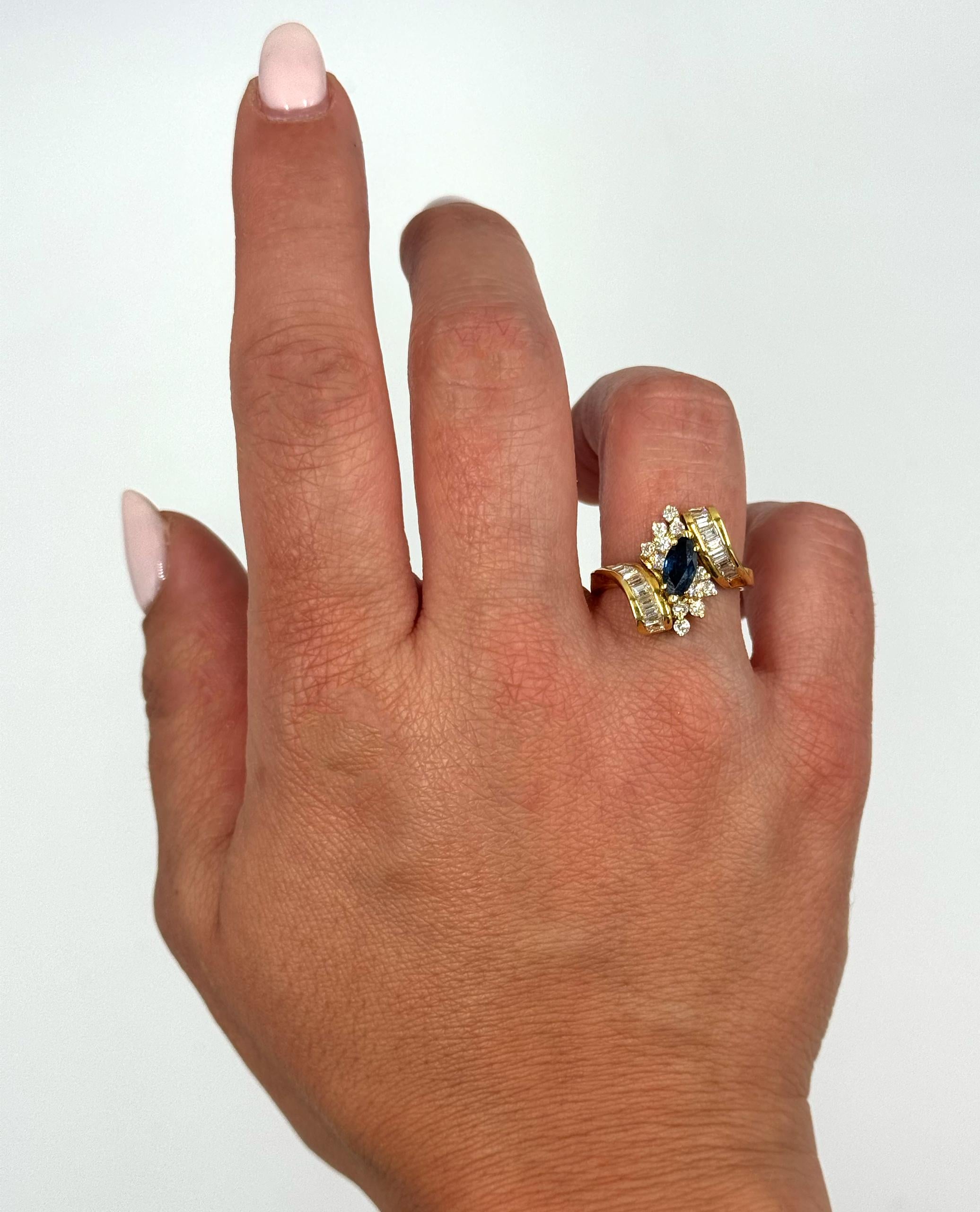 Women's Vintage Marquise Sapphire Ring with Baguette and Round Diamonds in 18K Gold For Sale