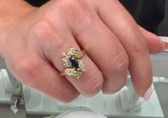 Vintage Marquise Sapphire Ring with Baguette & Round Diamonds in 18K Gold