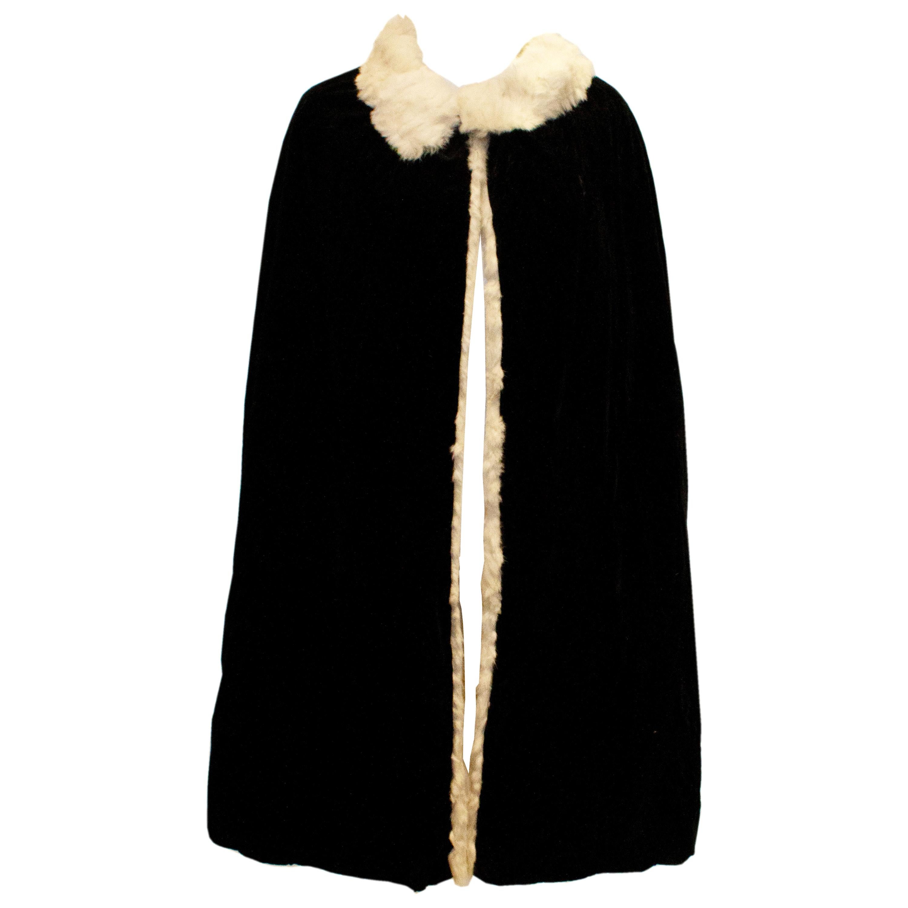 Vintage Marshall and Snelgrove Black Velvet Cape with Fur Lining. For Sale