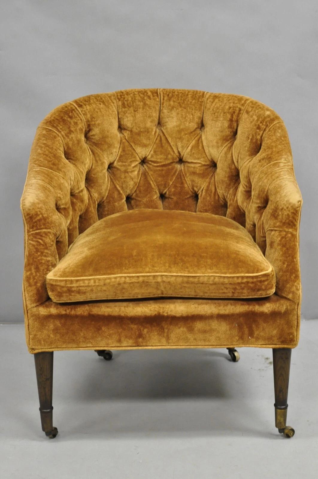 Vintage Marshall & Fields English Regency Style Tufted Orange/Brown Velvet Barrel Back Club Chair on Rolling Casters. Circa Mid 20th Century. Measurements: 30