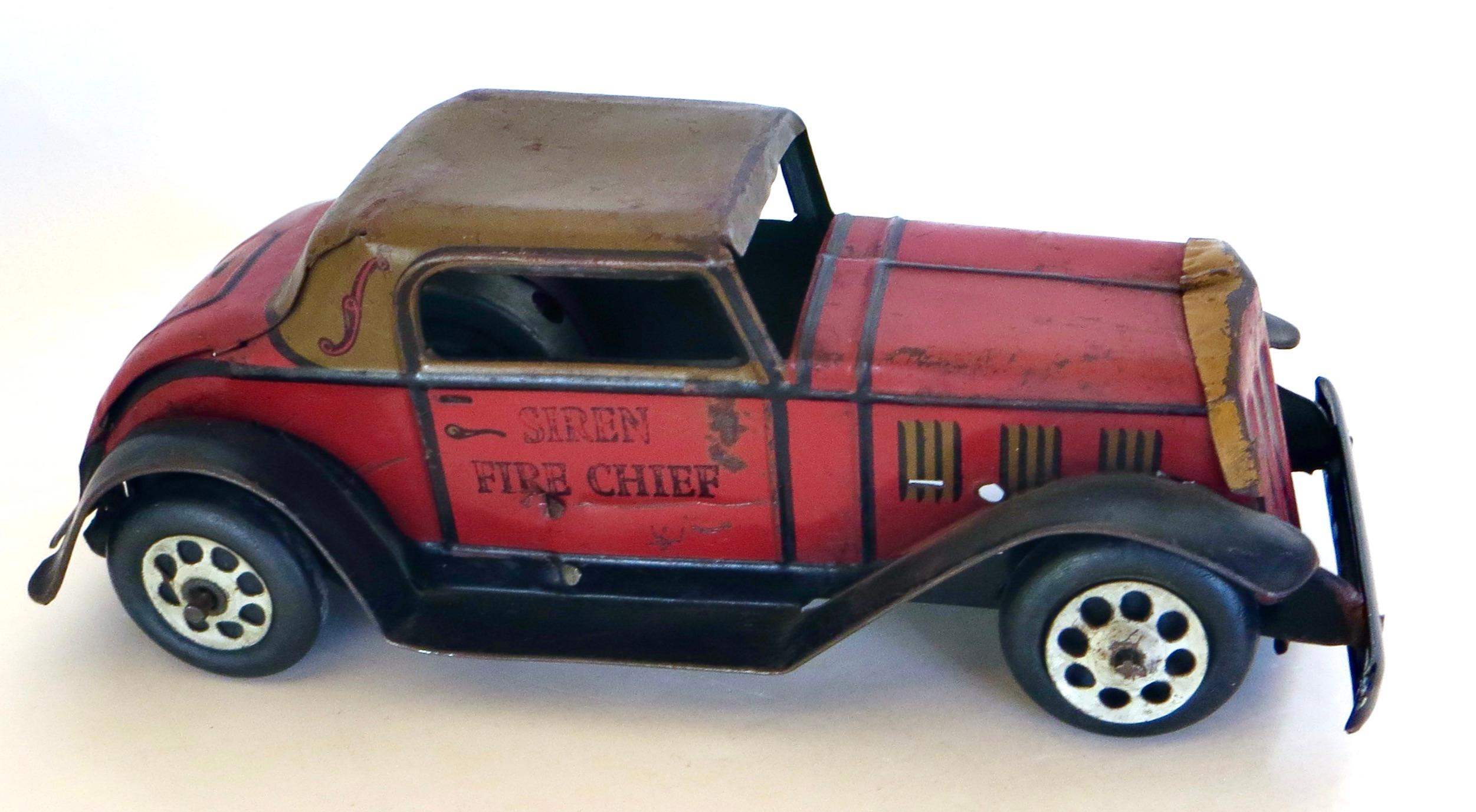 This original vintage friction activated toy sedan