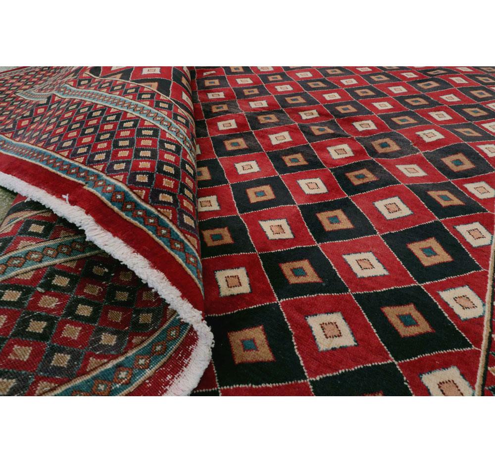 Vintage Mashad Art Deco Style Black and Red Rug In Excellent Condition For Sale In New York, NY