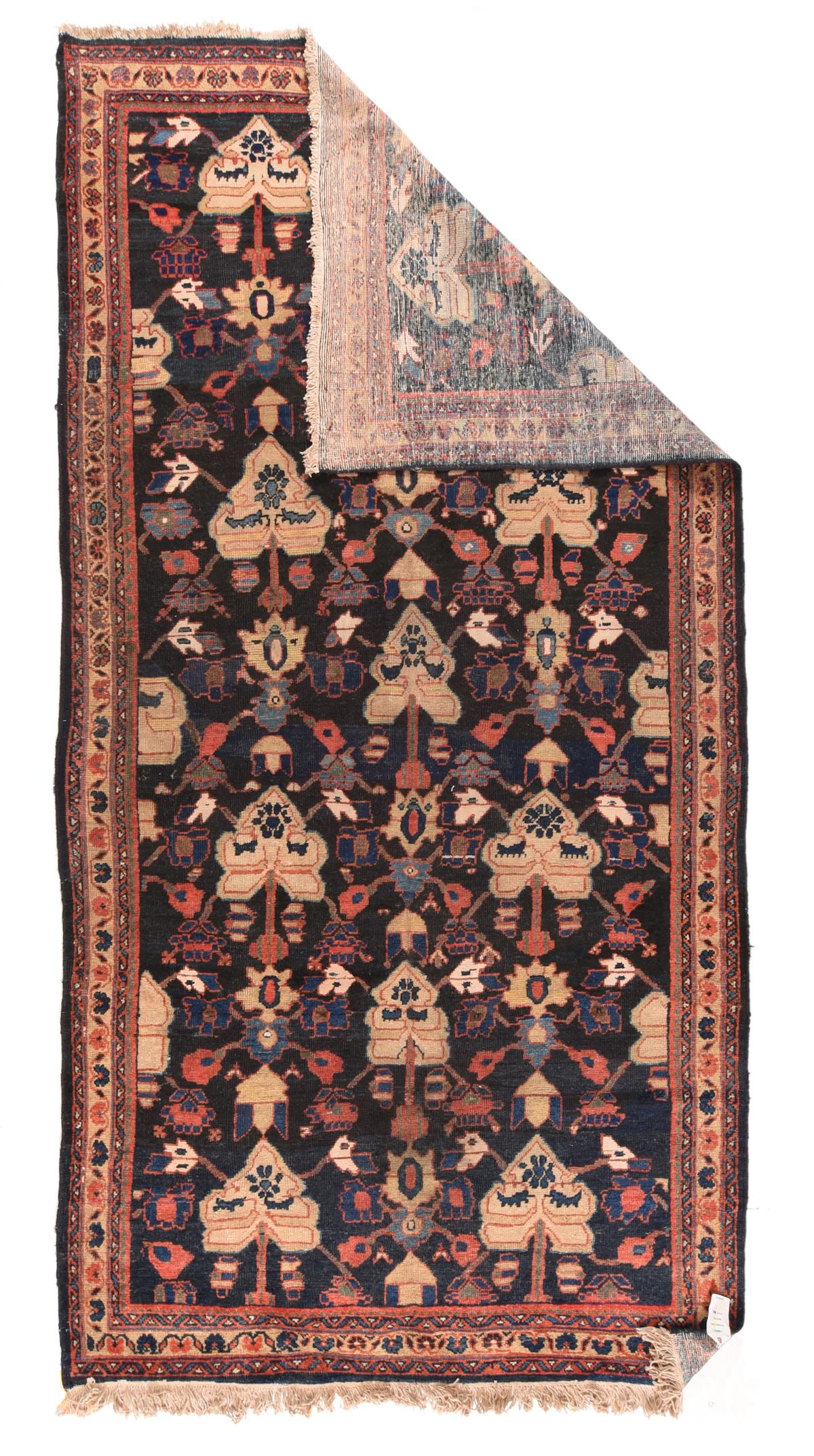 Vintage Mashad rug measures: 5'3'' x 10'3''.