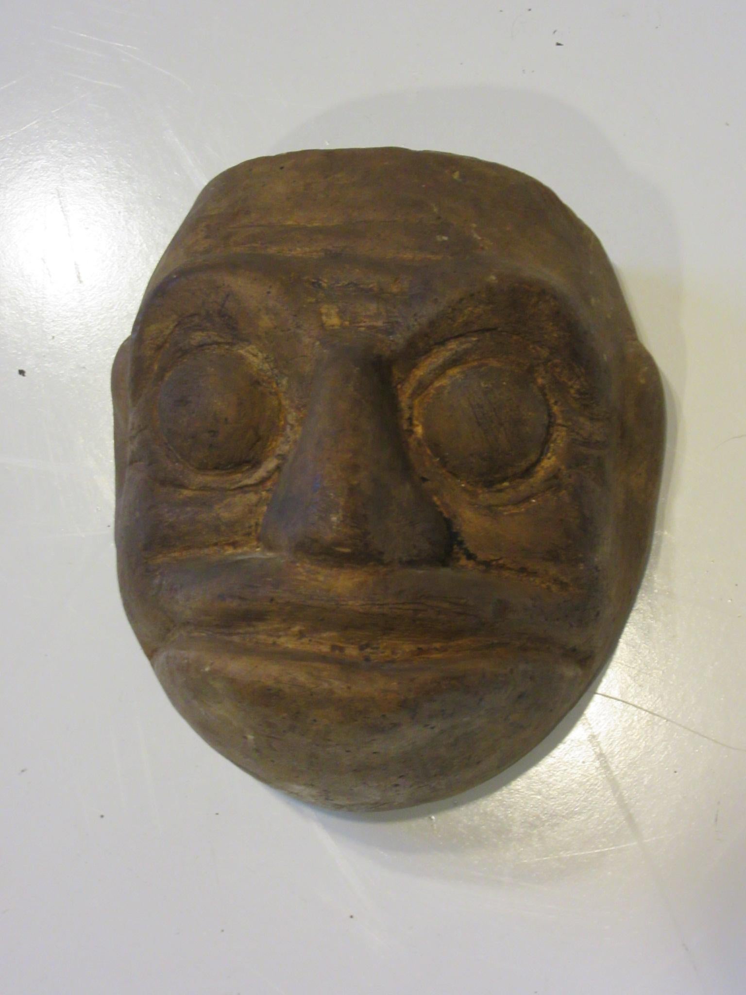 A vintage mask mold from the American Mask Company of a scary animal .