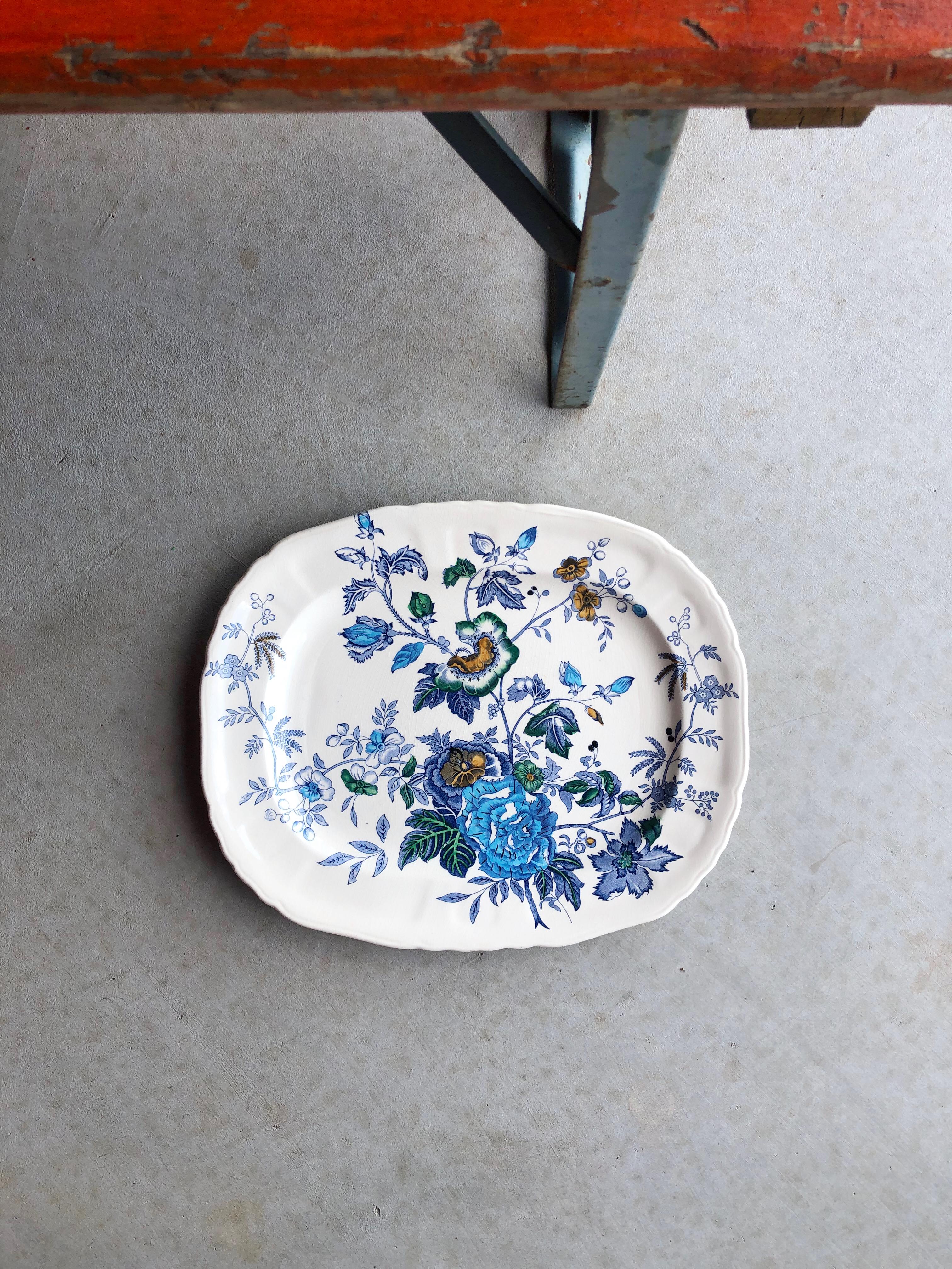 Mason’s Patent Ironstone “Belvedere” Platter, Made in England. Bright blue floral pattern to this oblong piece, depicting a wild assortment of blue flowers, vines and richly colored leaves. Pops of cobalt, turquoise, sea green and ochre yellow
