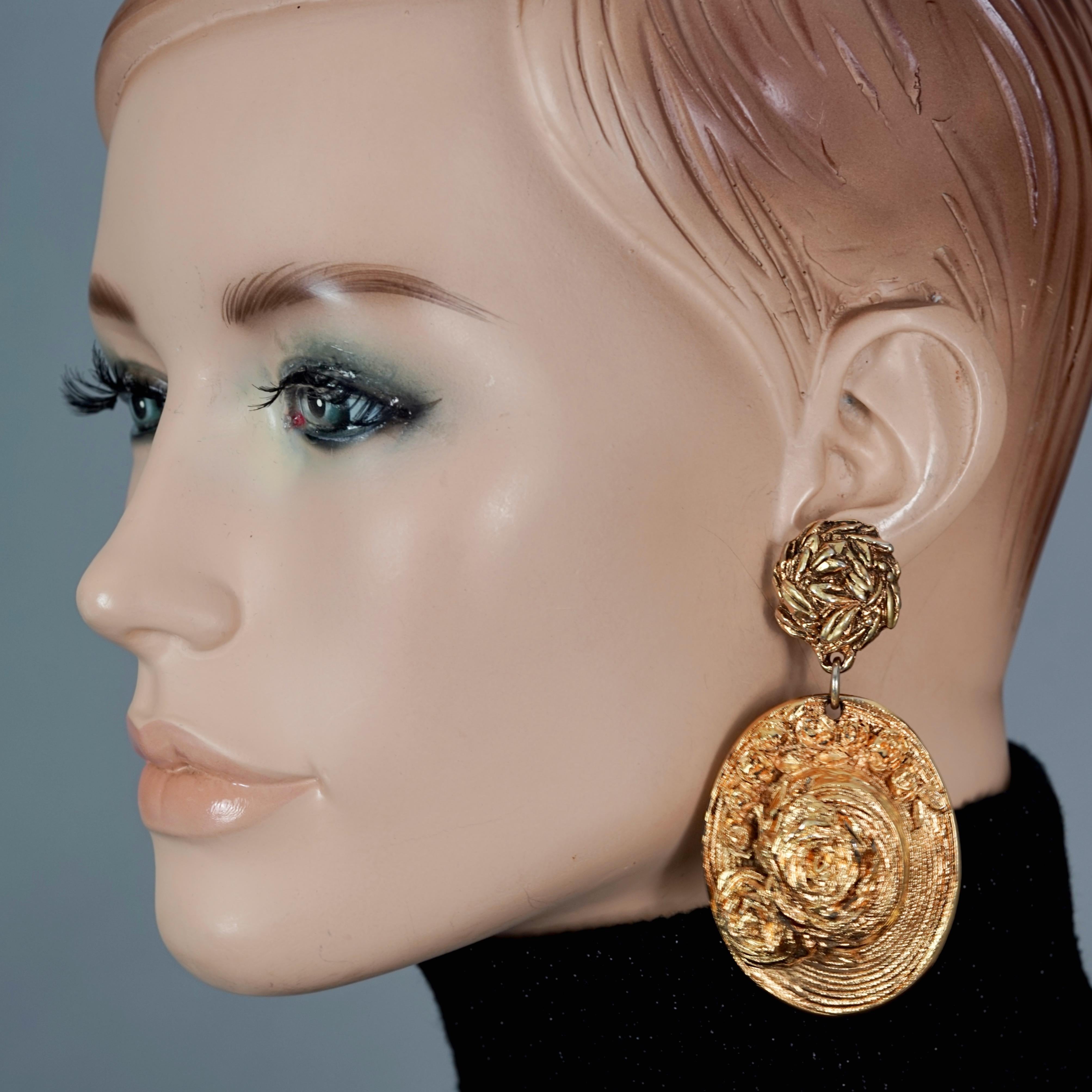 Vintage Massive CHANTAL THOMASS Flower Hat Dangling Earrings

Measurements: 
Height: 3.27 inches (8.3 cm)
Width: 1.65 inches (4.2 cm)
Weight per Earring: 29 grams

Features:
- 100% Authentic CHANTAL THOMASS.
- Massive hat dangling earrings with