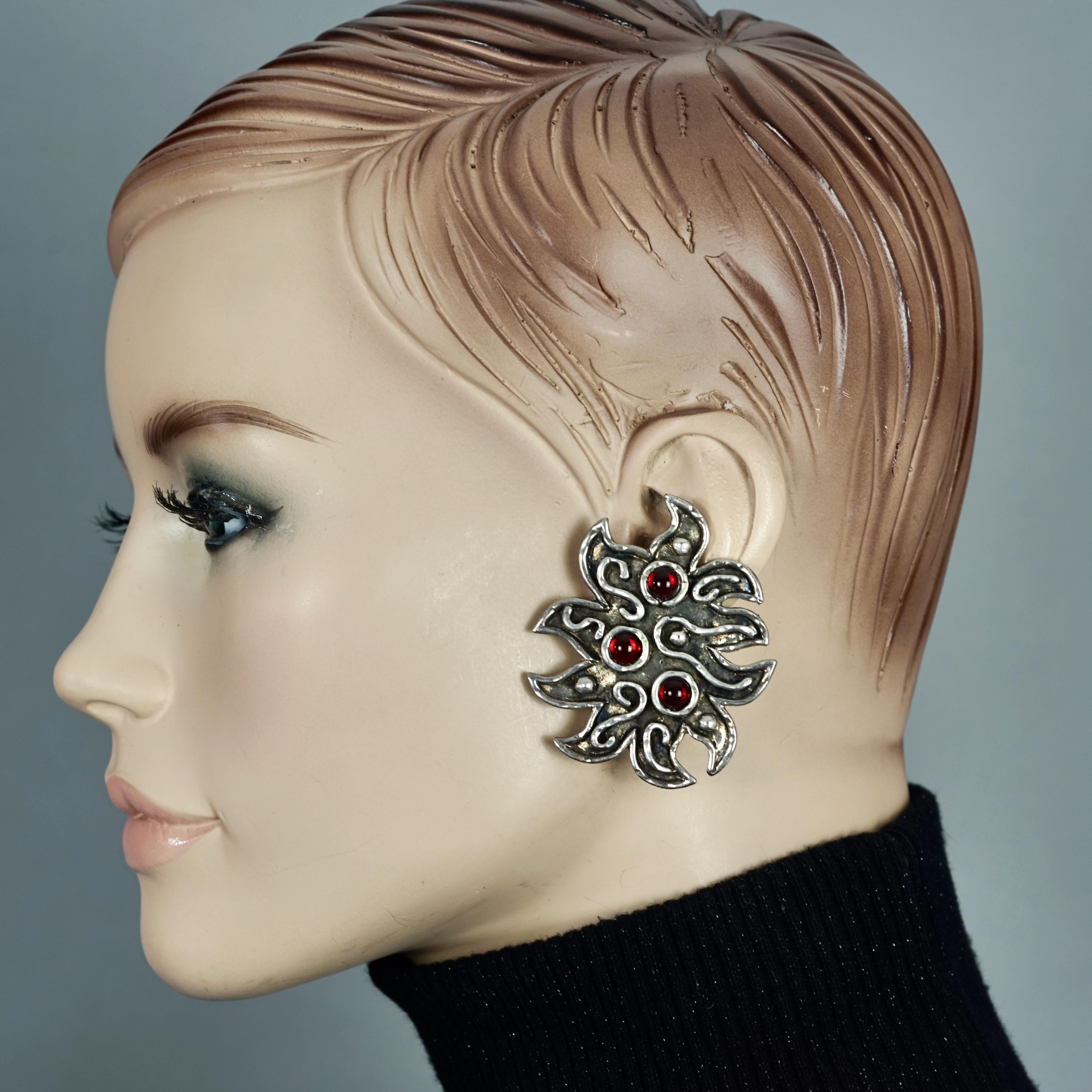 Vintage Massive EDOUARD RAMBAUD Ethnic Jeweled Silver Earrings

Measurements:
Height: 2.24 inches (5.7 cm)
Width: 1.85 inches (4.7 cm)
Weight per Earring: 19 grams

Features:
- 100% Authentic EDOUARD RAMBAUD.
- Massive ethnic statement earrings with