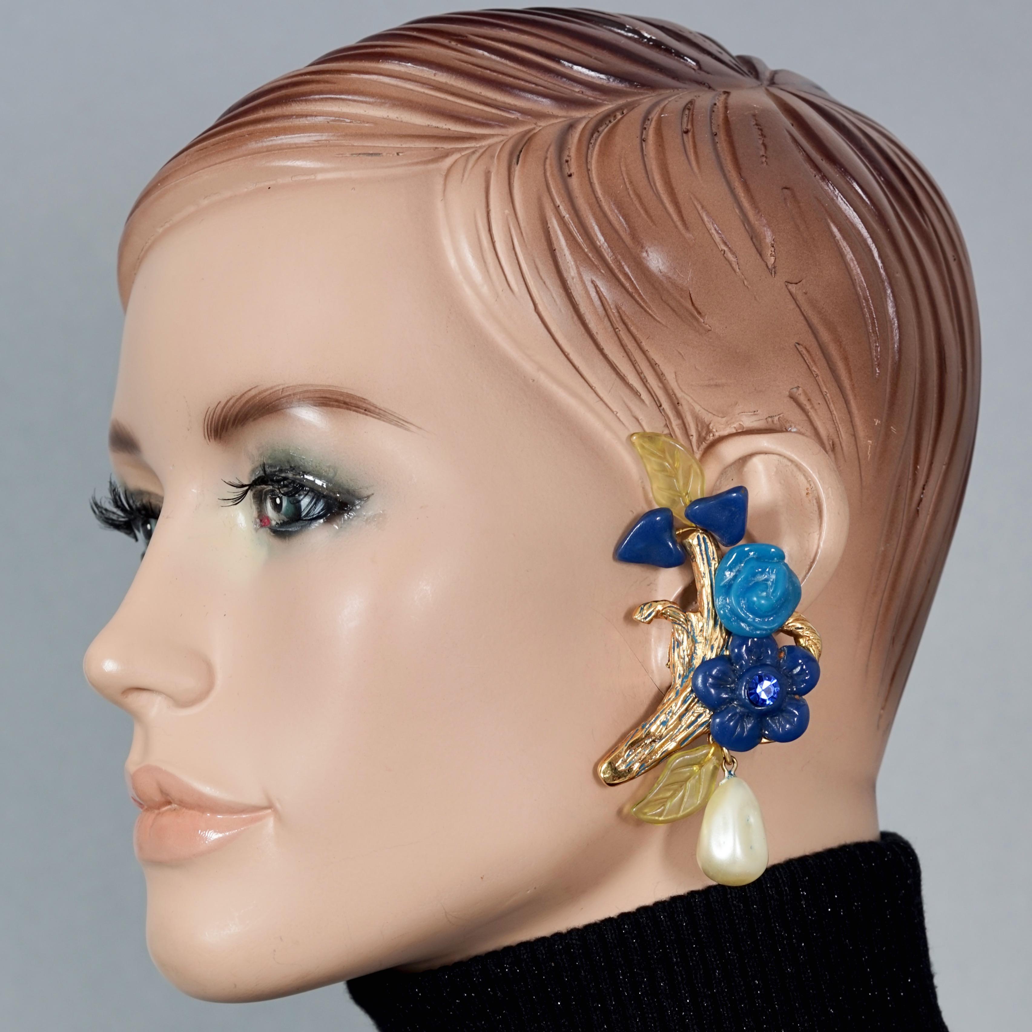 Vintage Massive KALINGER PARIS Branch Flower Leaves Pearl Dangling Earrings

Measurements:
Height: 3.81 inches (9.7 cm)
Width: 2 inches (5.1 cm)
Weight per Earring: 26 grams

Features:
- 100% Authentic KALINGER PARIS.
- Massive branch earrings with