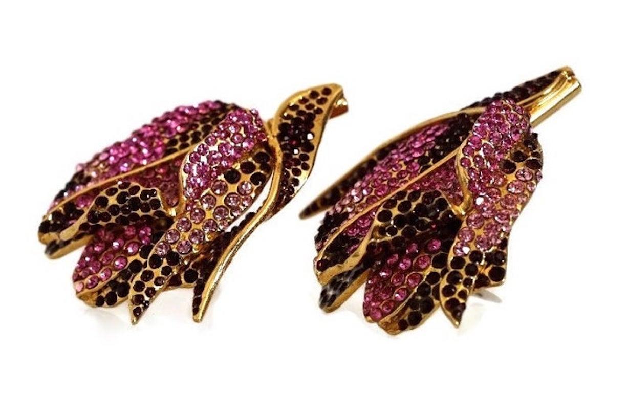 Vintage Massive LANVIN PARIS Orchid Rhinestone Earrings

MEASUREMENTS:
Height: 2 6/8 inches
Width: 2 4/8 inches
Depth: 5/8 inch

Features:
- 100% Authentic LANVIN PARIS.
- Massive 3 dimensional orchid flower.
- Studded with rhinestones - vintage