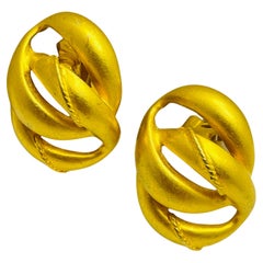 Vintage massive matte gold tone designer runway clip on earrings