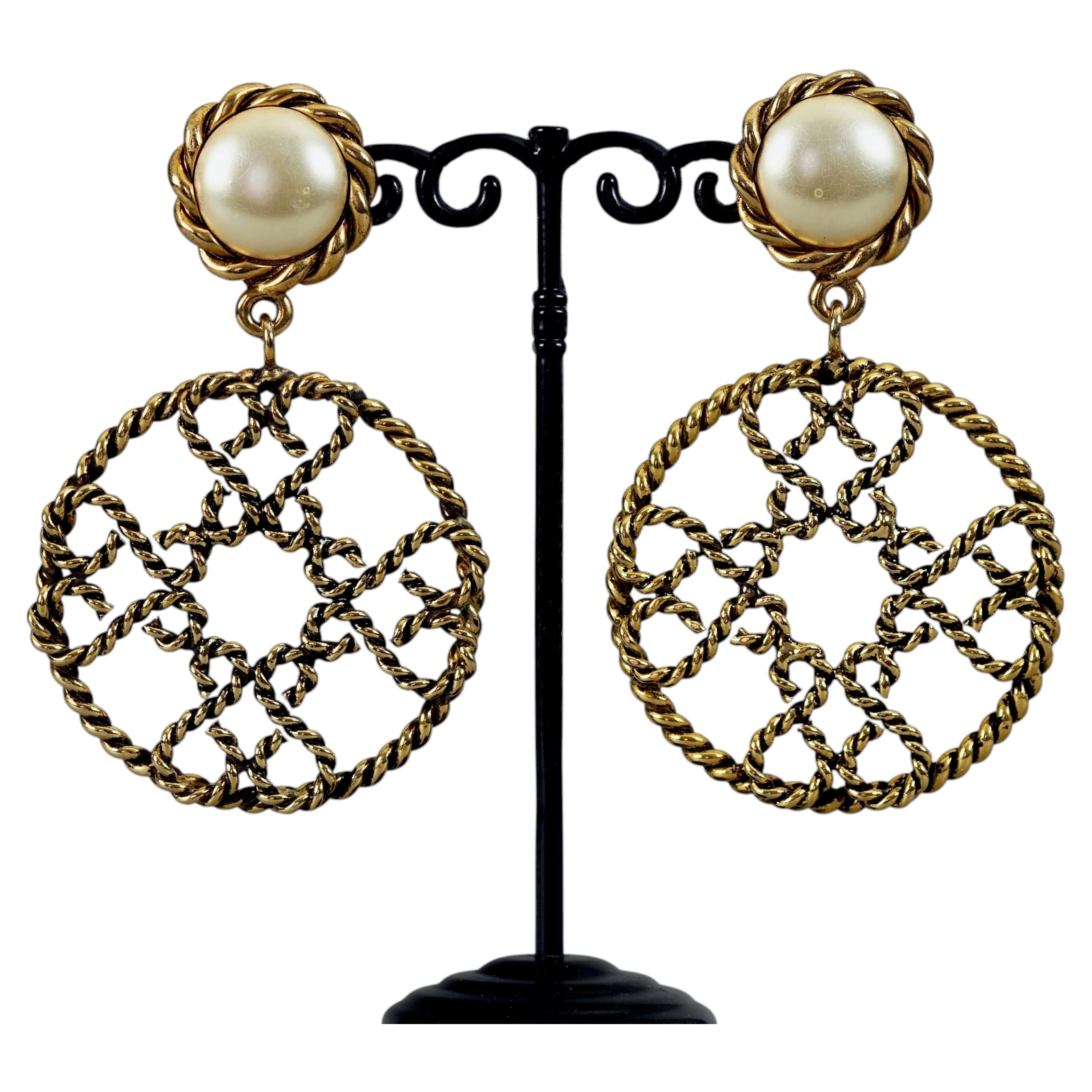 Vintage Massive MOSCHINO Pearl Torsade Round Cross Novelty Earrings For Sale