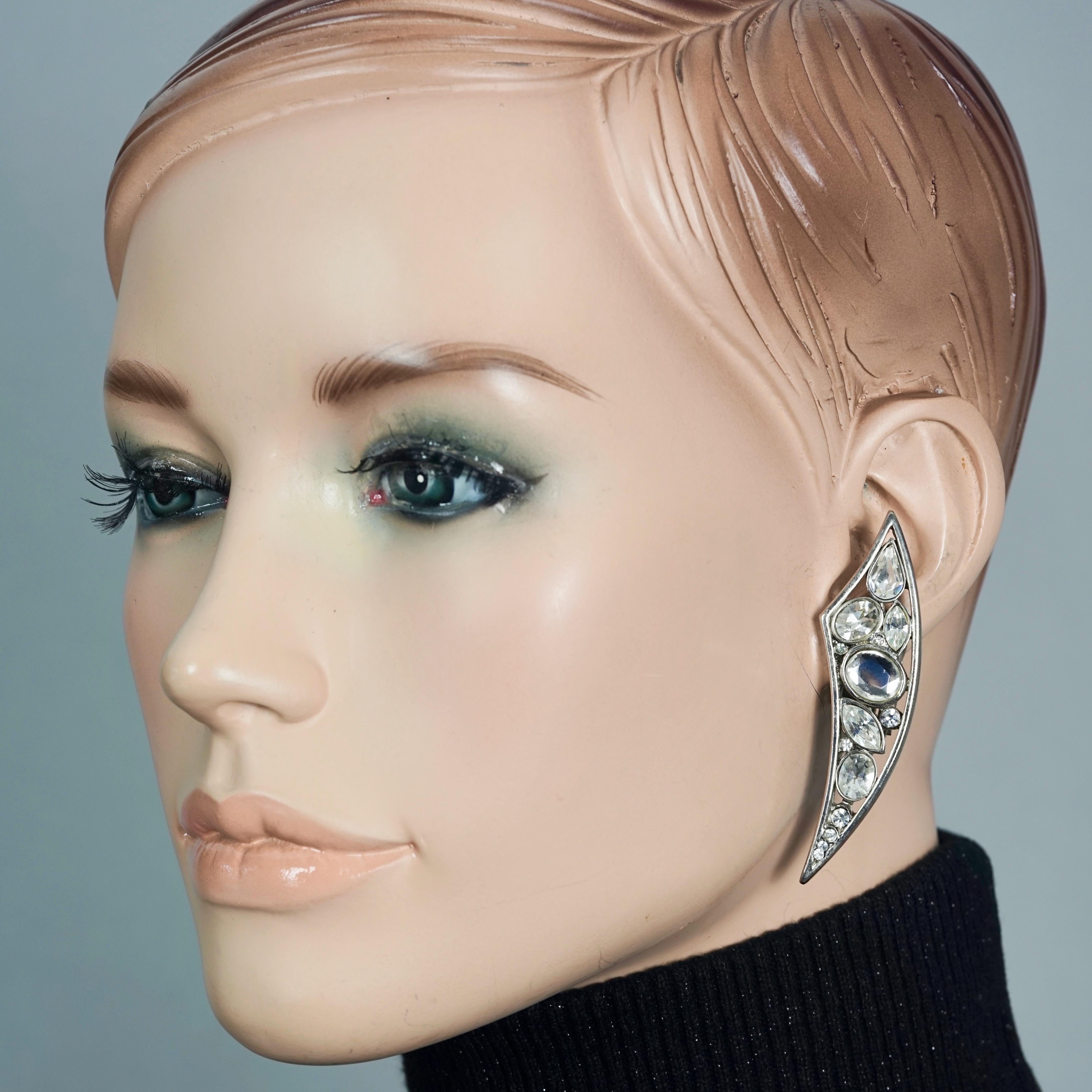Vintage Massive SCHERRER PARIS Rhinestone Studded Pointed Earrings

Measurements:
Length: 2.36 inches (6.6 cm)
Width: 0.79 inch (2 cm)
Weight per Earring: 13 grams

Features:
- 100% Authentic SCHERRER PARIS.
- Pointed earrings studded with clear
