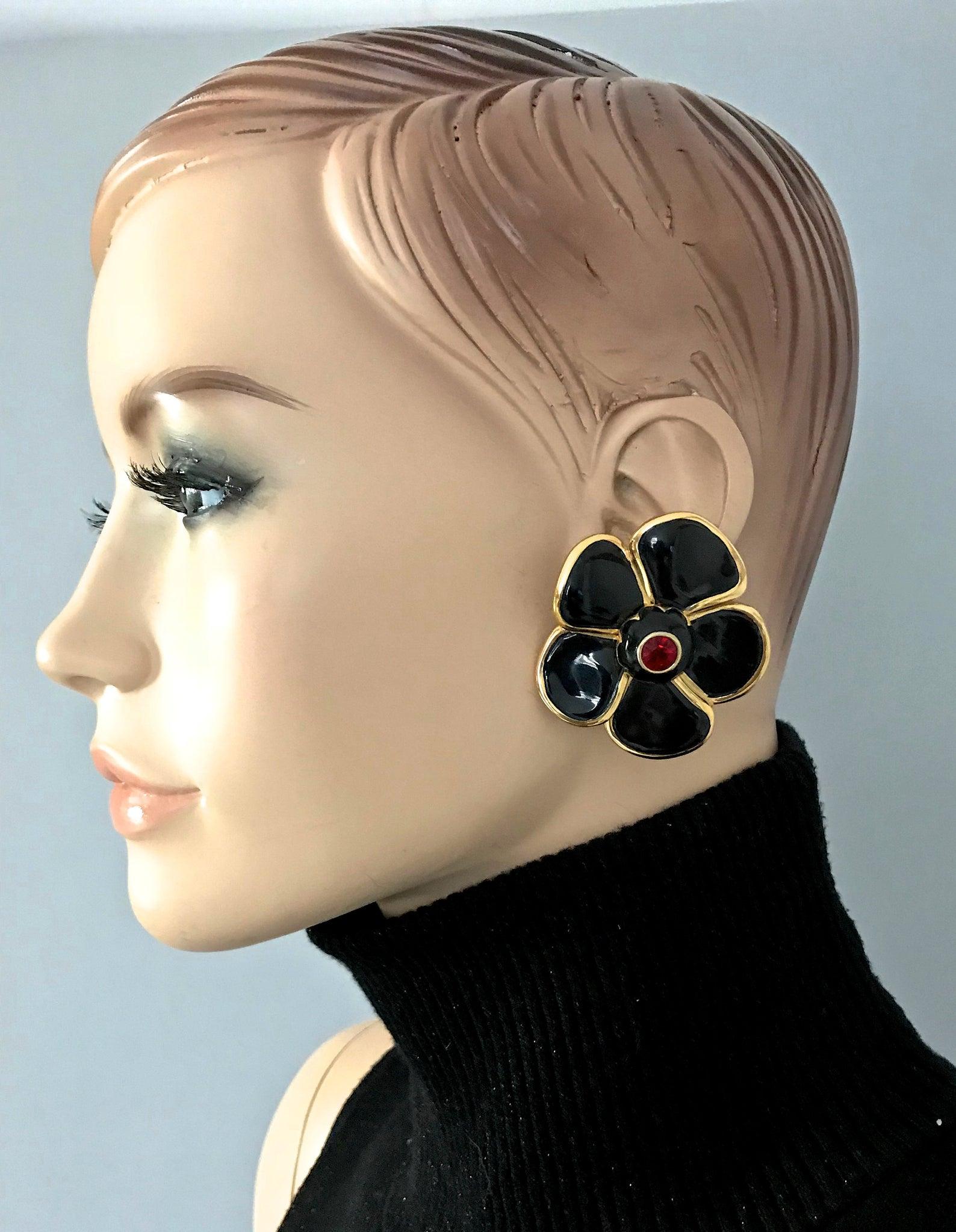 Vintage Massive YVES SAINT LAURENT Ysl Flower Enamel Rhinestone Earrings

Measurements:
Height: 2 inches (5.1 cm)
Width: 1.85 inches (4.7 cm)
Weight per Earring: 32 grams

Features:
- 100% Authentic YVES SAINT LAURENT.
- Massive flower enamel