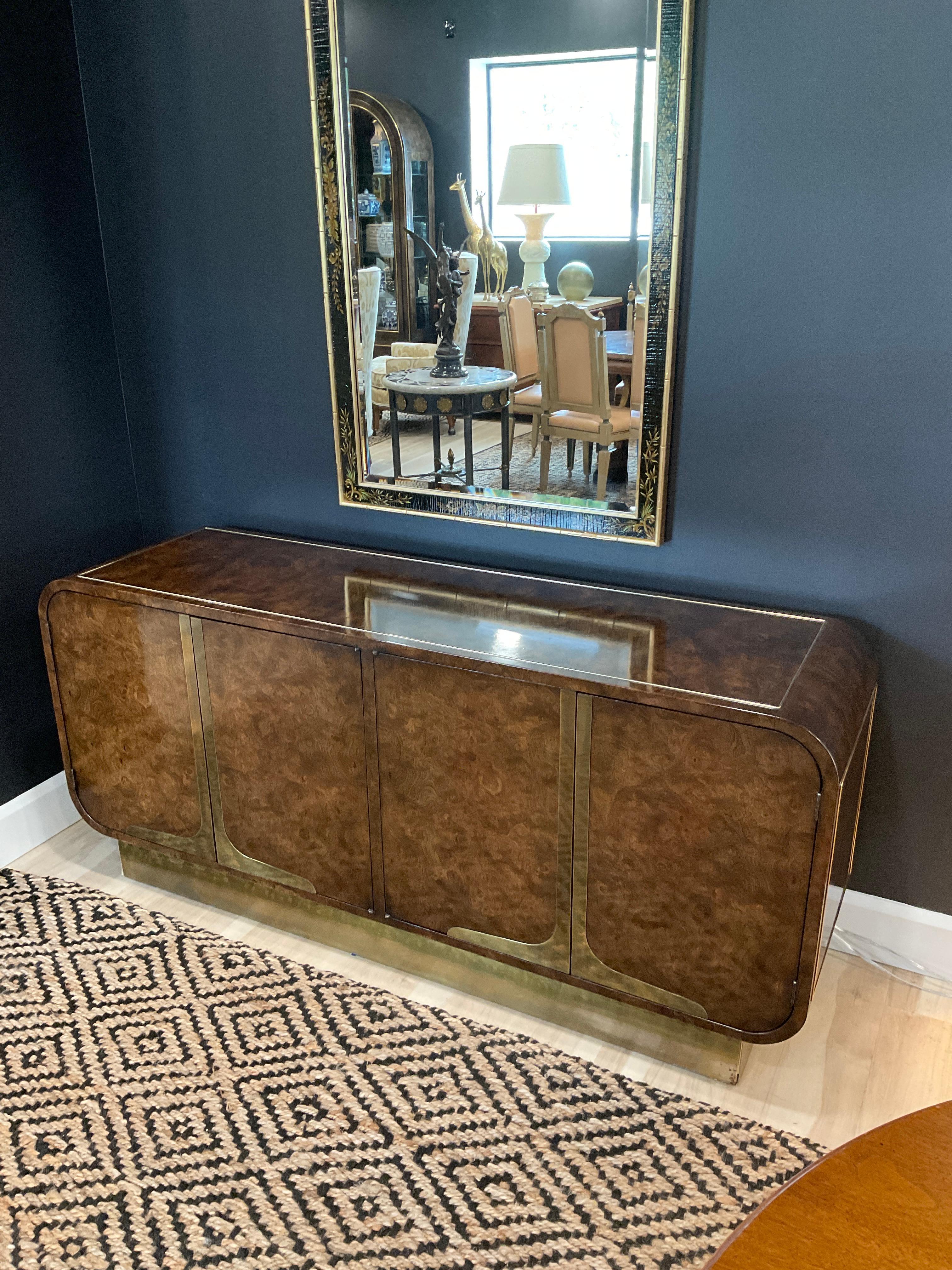 Ultra rare Burled cabinet by William Doezema for Mastercraft. These pieces from this collection are softer in their lines and size. Rounded edges replace right angled corners and bring a heavy Art deco influence to the pieces in this collection.