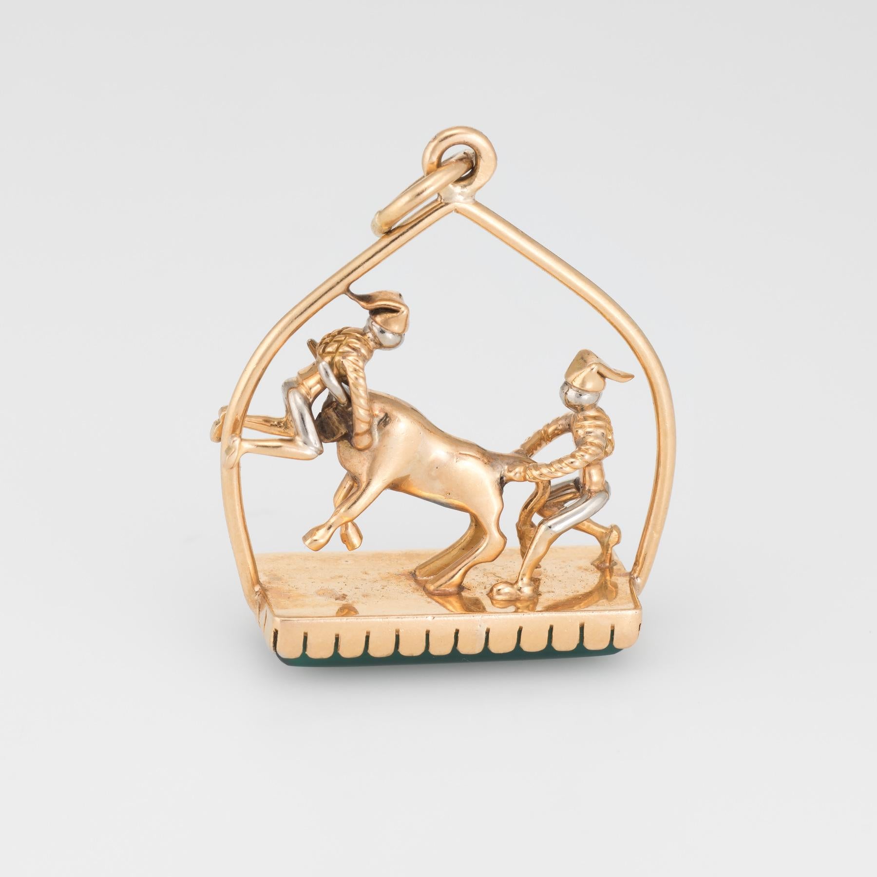Finely detailed vintage Matador pendant or charm, crafted in 18 karat yellow gold. 

Chrysoprase measures 20mm x 9mm. The chrysoprase is in excellent condition and free of cracks or chips.

The detailed figural features a bull fighting scene with a