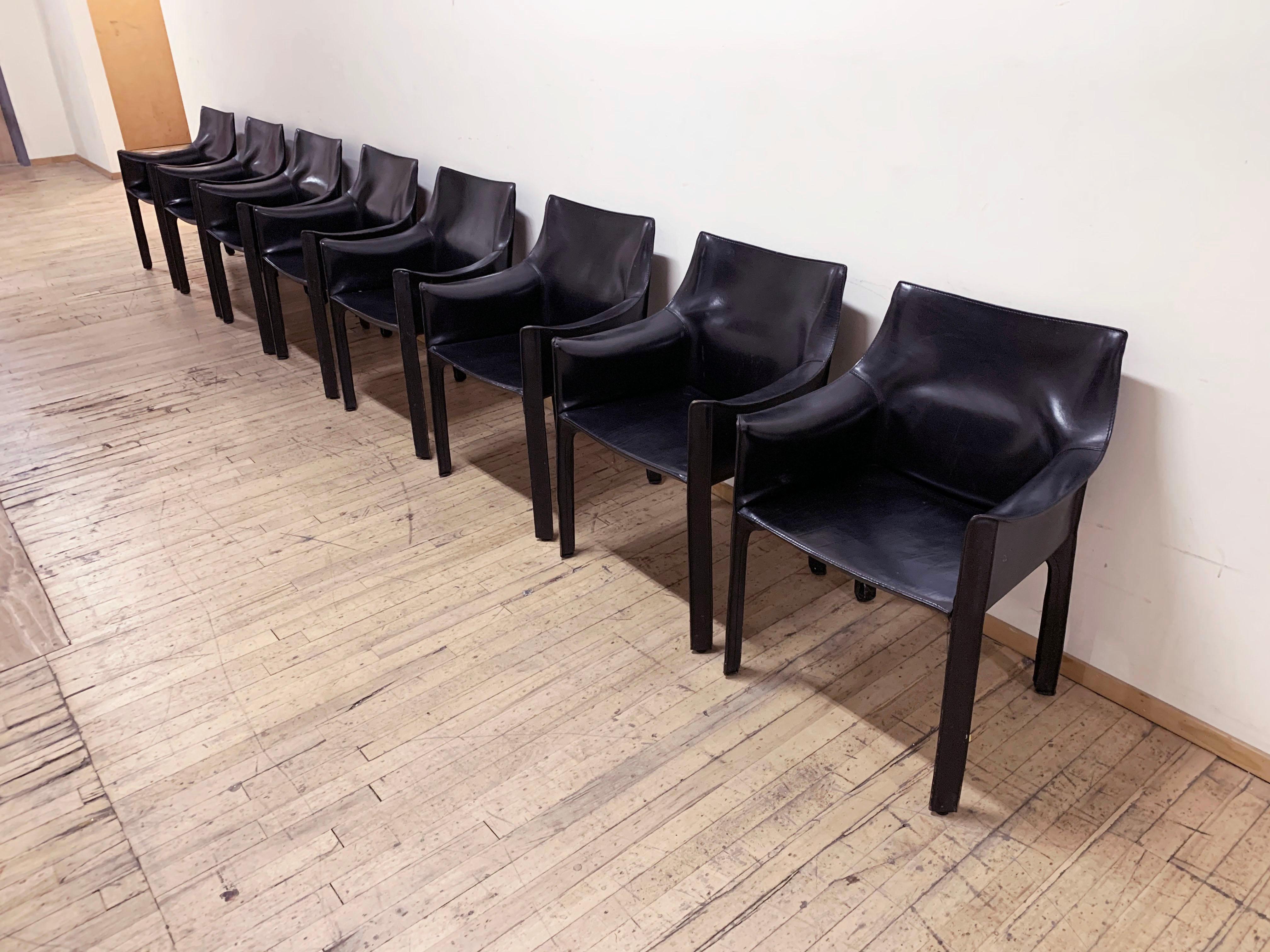 Vintage matched set of 8 Mario Bellini black leather cab armchairs for Cassina.