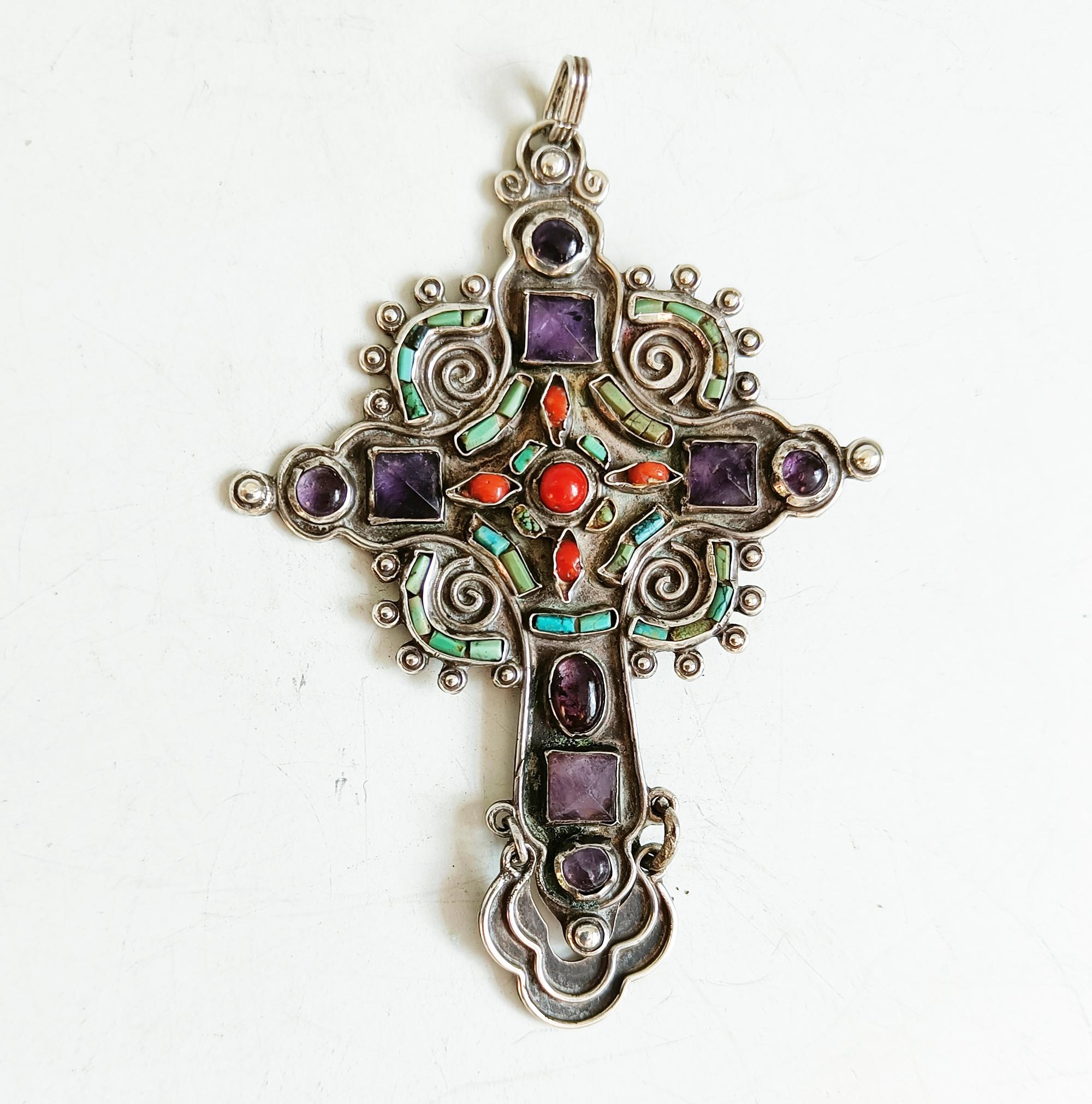 Vintage MATL Matilde Poulat Gemstone Inlaid Silver Cross – Taxco Mexico, 1950s

A stunning and collectible vintage silver cross pendant by renowned Mexican silversmith Matilde Poulat (MATL), crafted in Taxco, Mexico, and dating to the 1950s. This