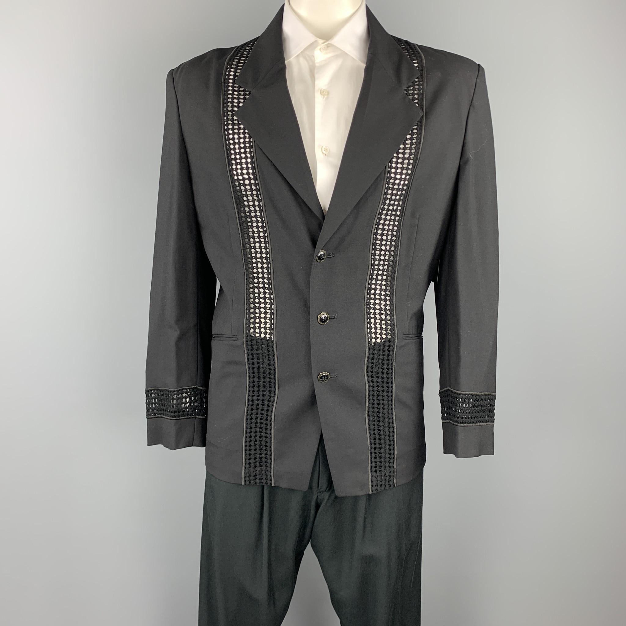 VINTAGE MATSUDA suit comes in black rayon / wool with mesh details and includes a single breasted, three button sport coat with a notch lapel and matching pleated front trousers. Made in Japan.

Very Good Pre-Owned Condition.
Marked: No size marked