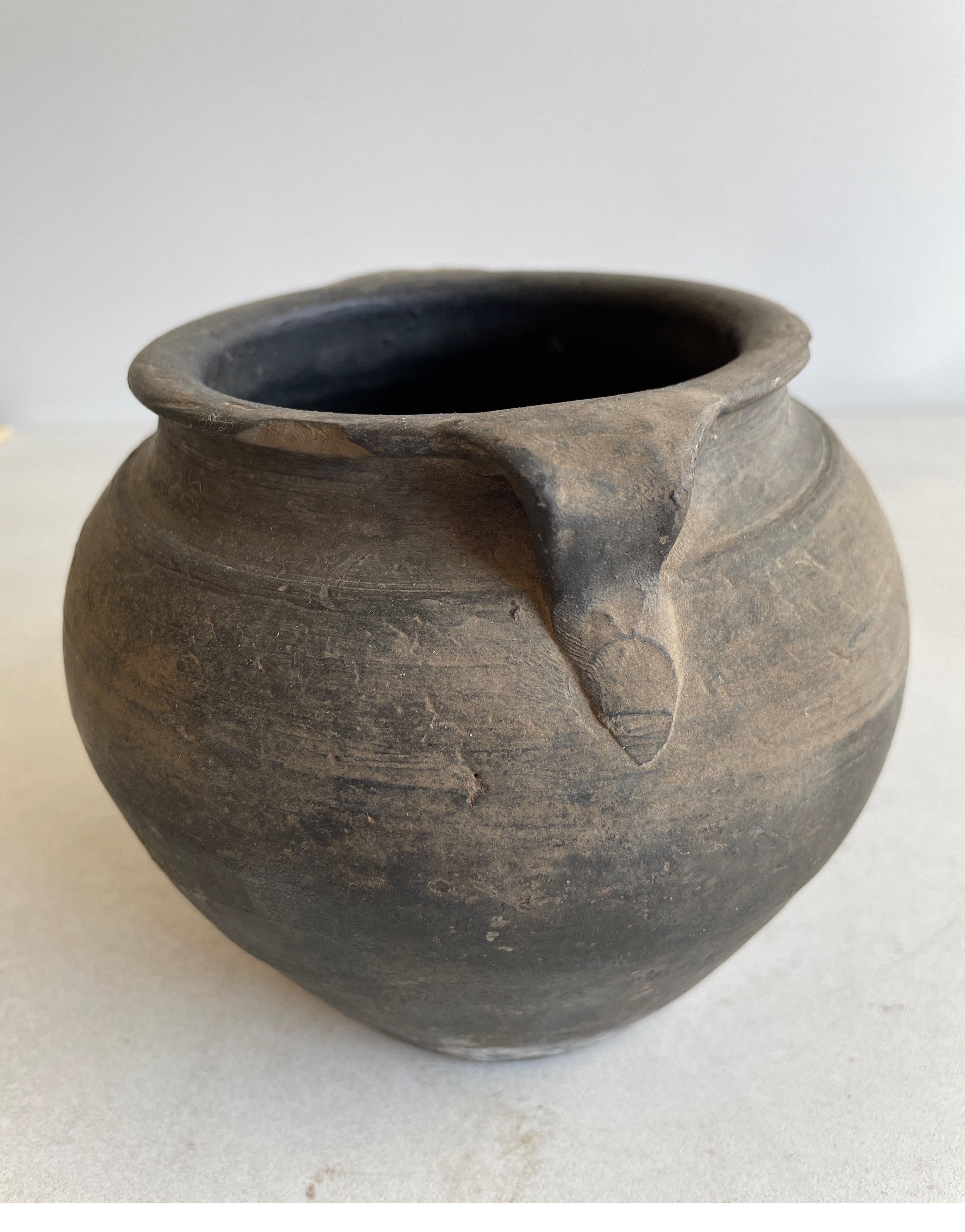 Vintage Matte Oil Pots Pottery beautifully terracotta rich in character, this vintage oil pot adds just the right amount of texture + warmth where you need it. Stunning matte finish with warm terra-cotta accents, and dark grey tones. Each piece is