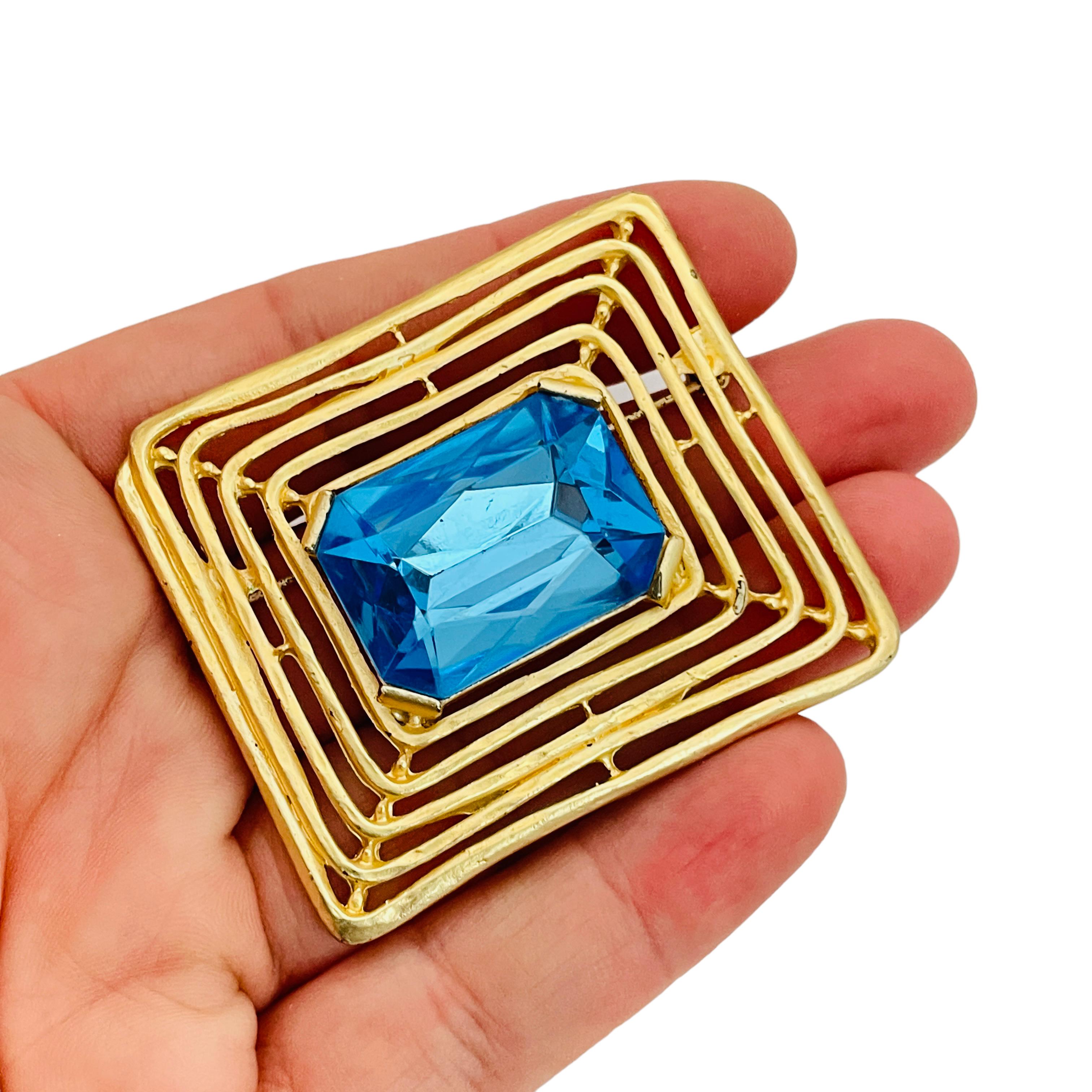 Women's or Men's Vintage matte gold blue glass designer runway brooch earrings set For Sale