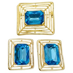 Vintage matte gold blue glass designer runway brooch earrings set