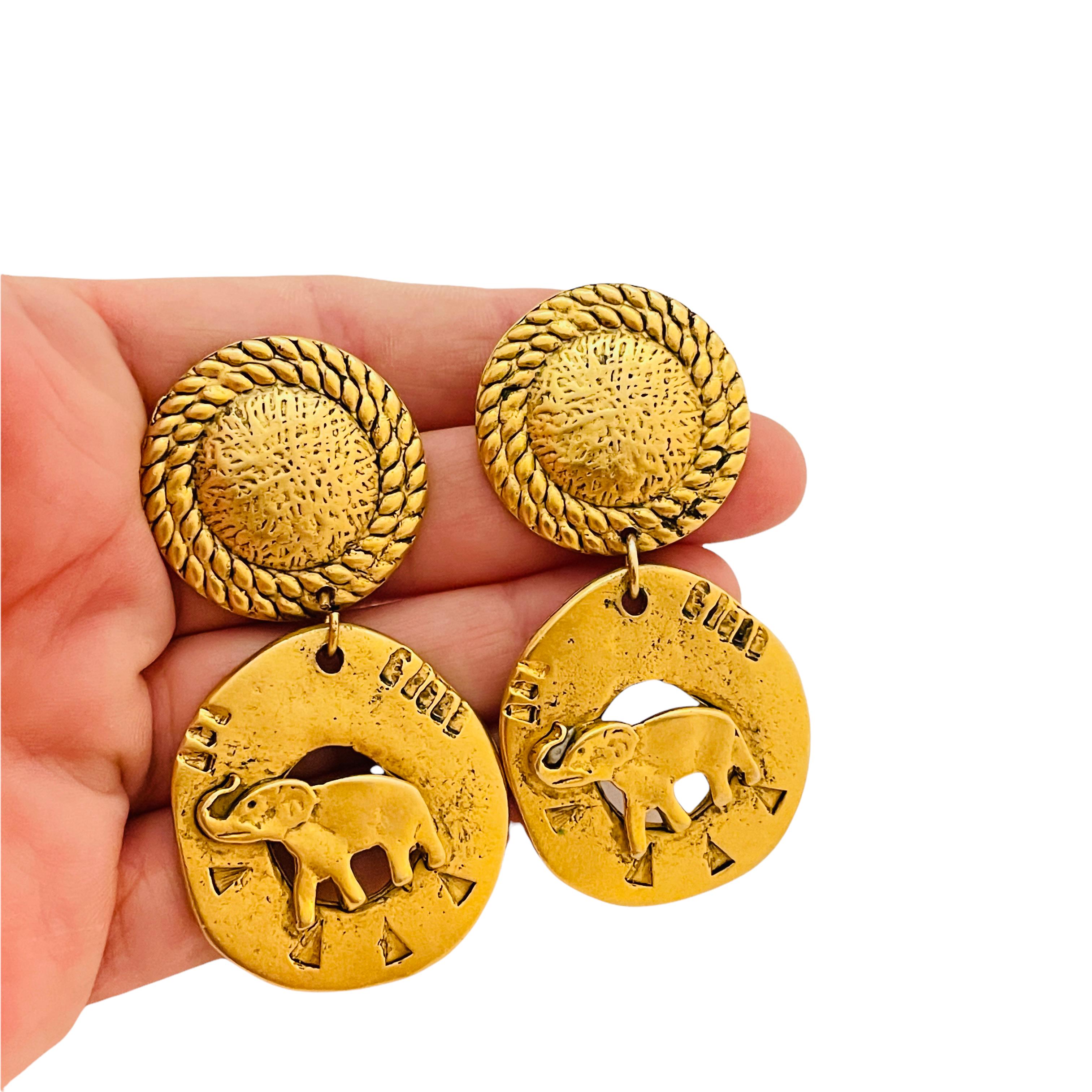 Women's Vintage matte gold enamel dangle elephant designer runway earrings For Sale