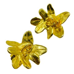 Vintage matte gold flower designer runway clip on earrings