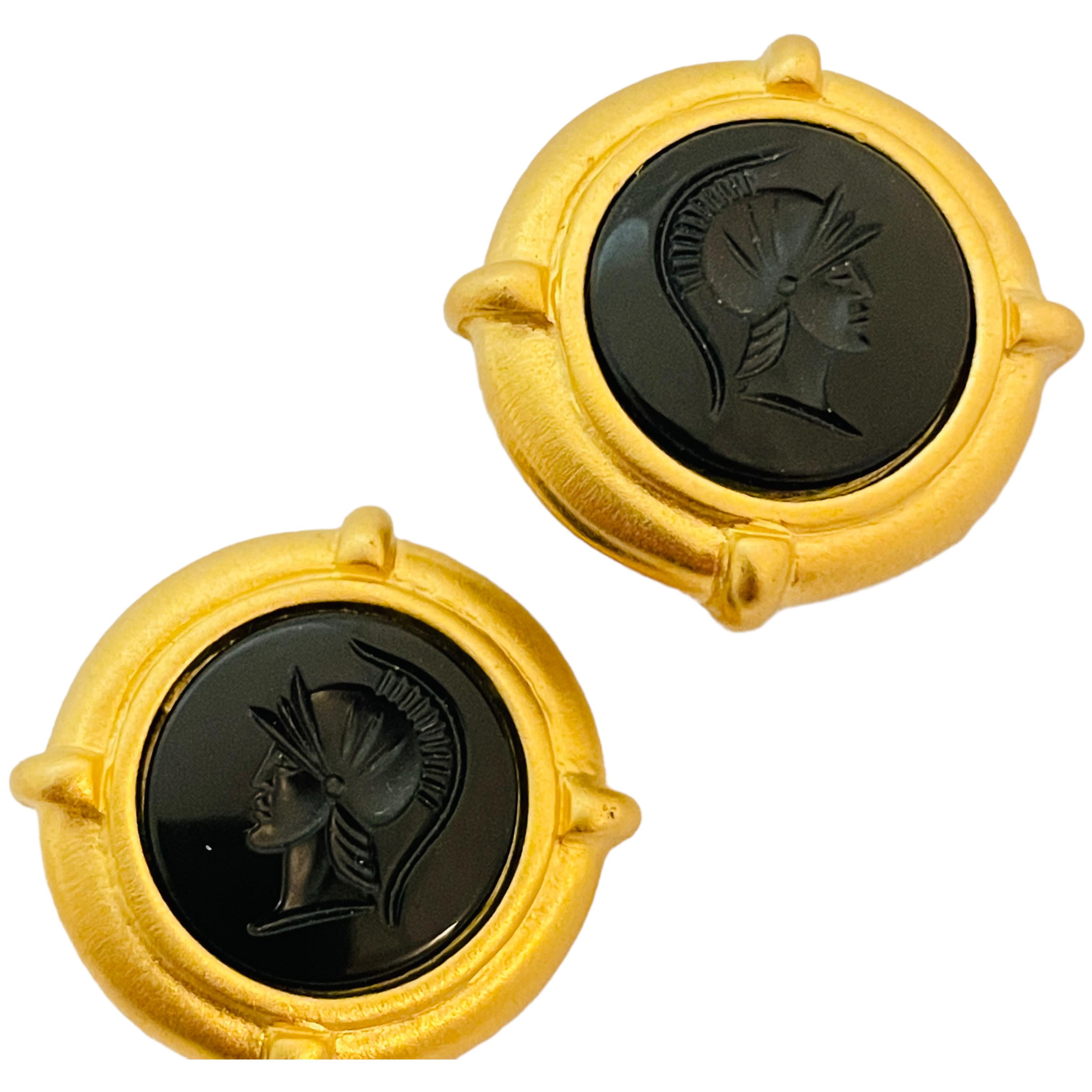 DETAILS

• unsigned

• gold tone with glass

• vintage designer clip on earrings

MEASUREMENTS

• 1