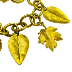 Vintage matte gold leaf charm chain designer runway bracelet