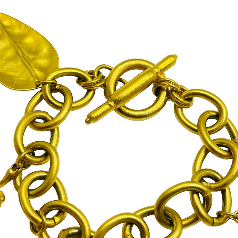 Vintage matte gold leaf charm chain designer runway bracelet For Sale