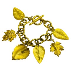 Vintage matte gold leaf charm chain designer runway bracelet