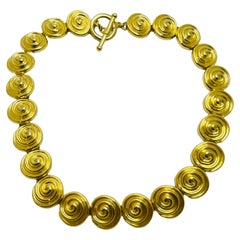 Used matte gold modernist designer runway necklace