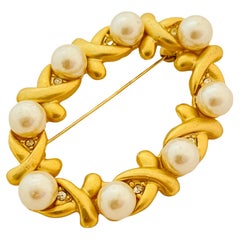 Vintage matte gold pearl rhinestone designer runway brooch