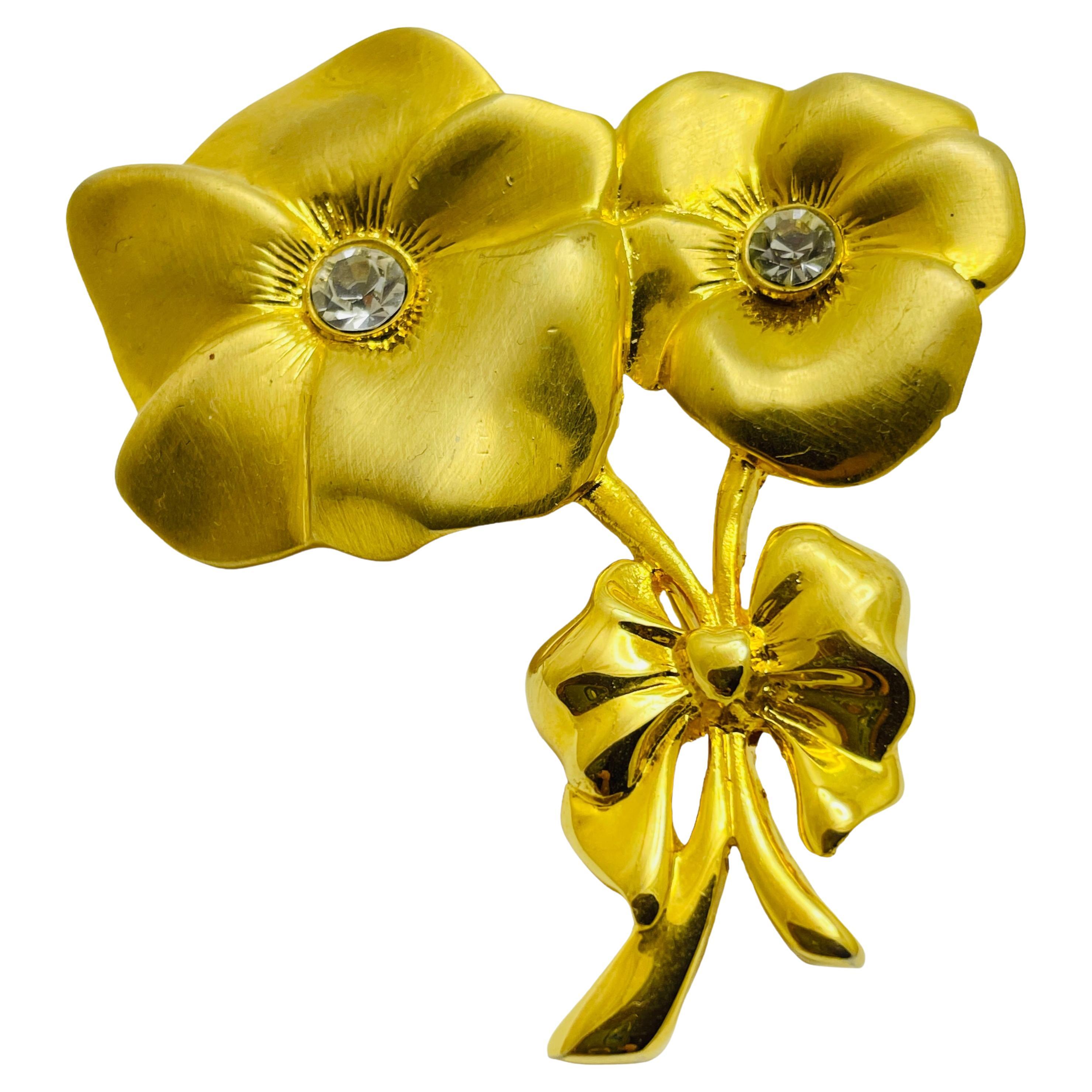 Spilla d'epoca con fiore di strass d'oro opaco