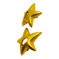 Vintage matte gold star designer clip on earrings