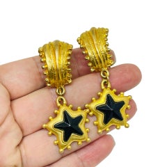 Vintage matte gold tone black glass stars designer clip on earrings