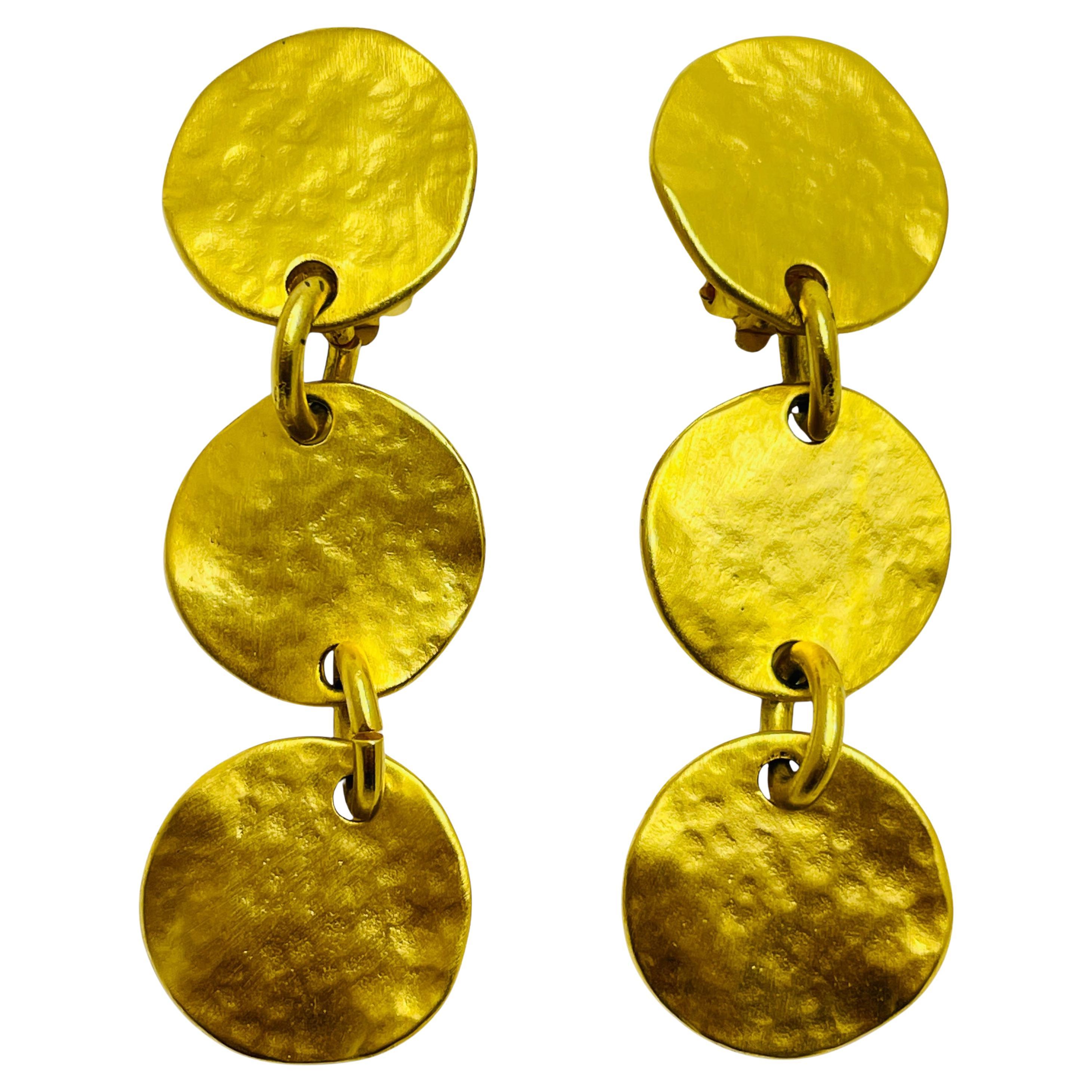 Vintage matte gold tone dangle coin designer runway clip on earrings For Sale