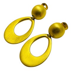 Vintage matte gold tone dangle designer runway clip on earrings