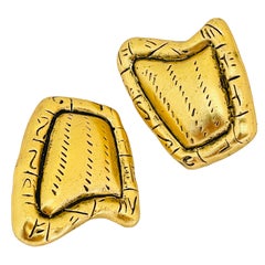 Vintage matte gold tone designer clip on earrings