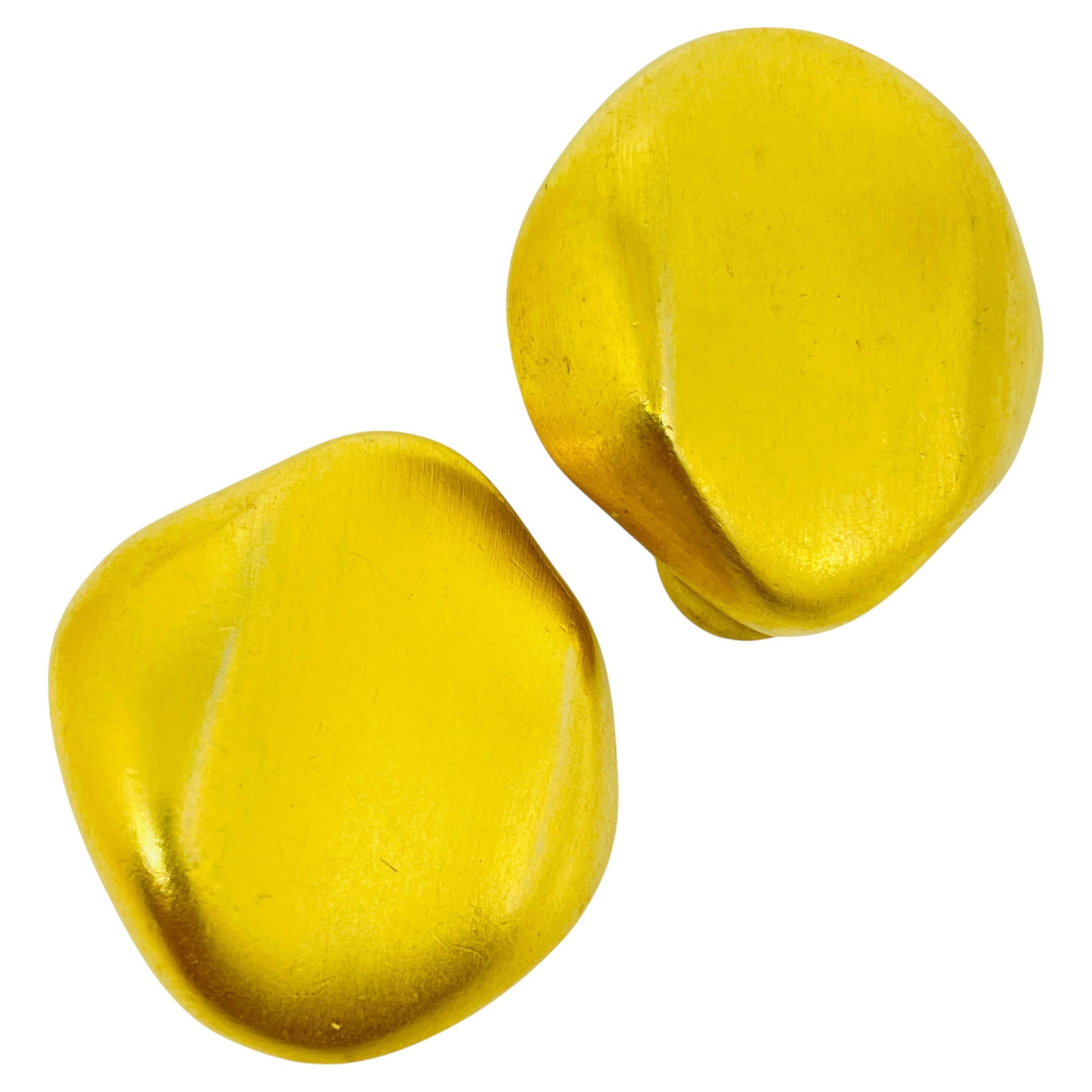 Vintage matte gold tone designer clip on earrings For Sale