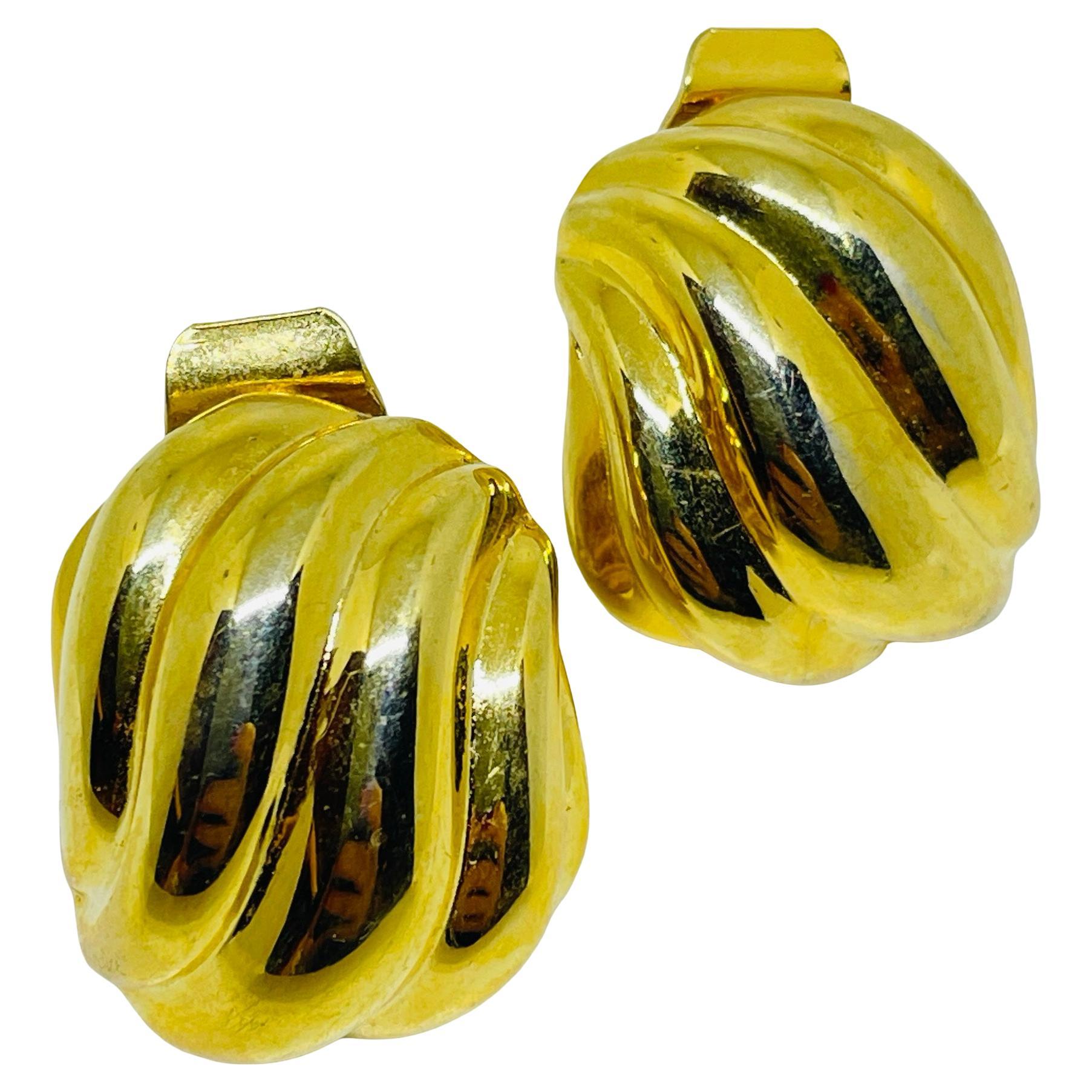 Vintage matte gold tone designer clip on earrings