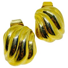 Vintage matte gold tone designer clip on earrings