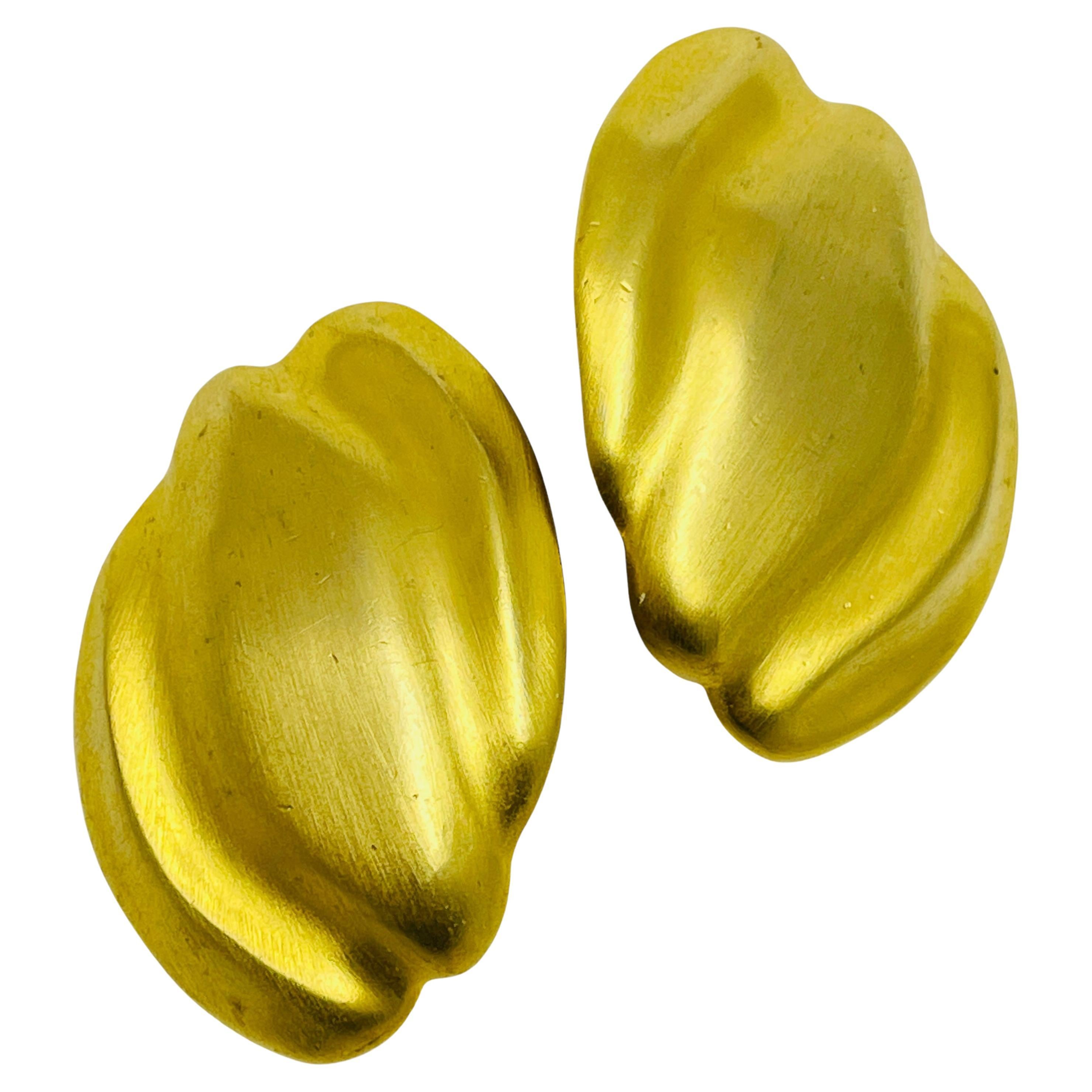 Vintage matte gold tone massive designer clip on earrings